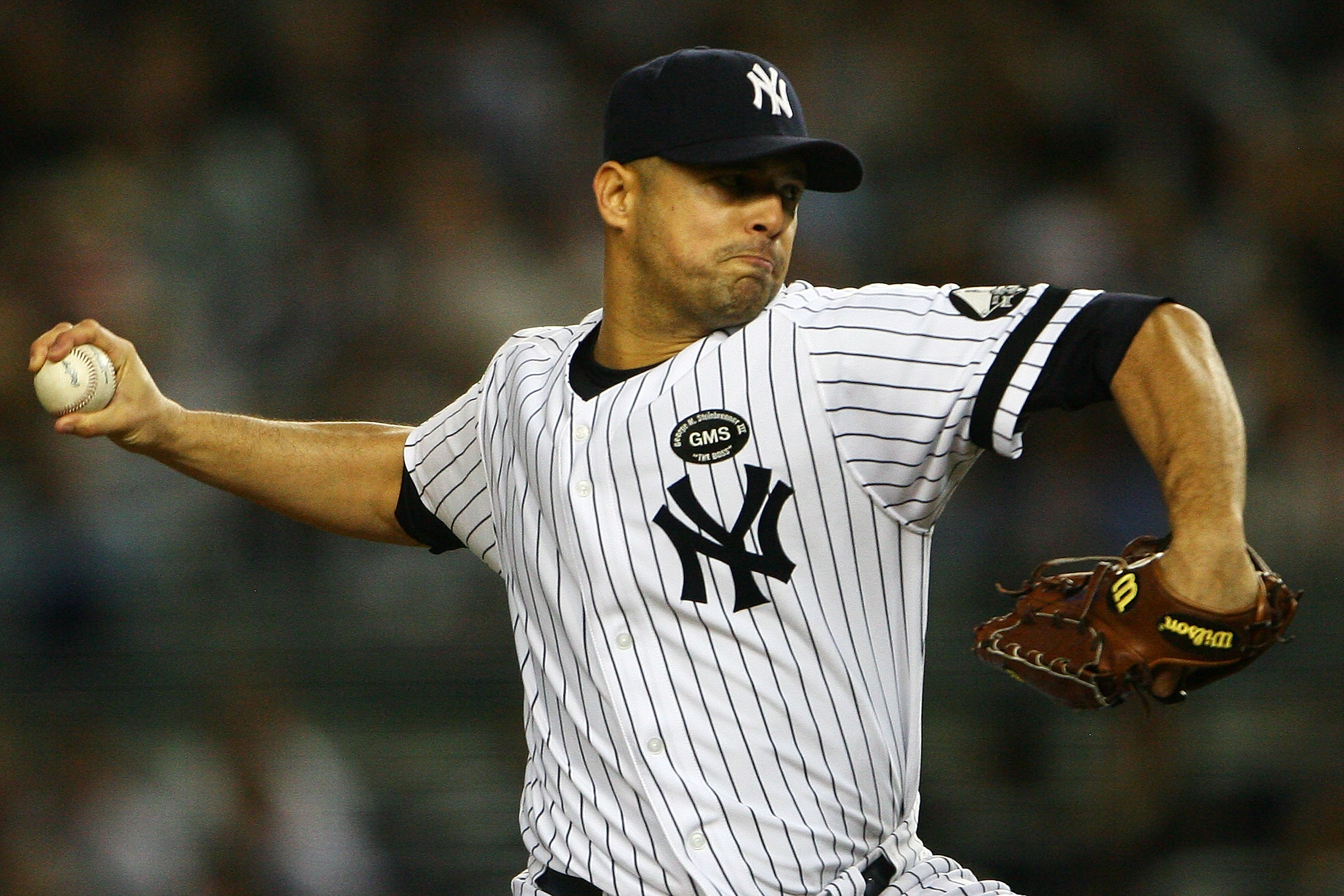 NEW YORK - SEPTEMBER 21:  Javier Vazquez #31 of the New York Yankees pitches against the Tampa Bay Rays on September 21, 2010 at Yankee Stadium in the Bronx borough of New York City. The Yankees defeated the Rays 8 -3.  (Photo by Andrew Burton/Getty Image
