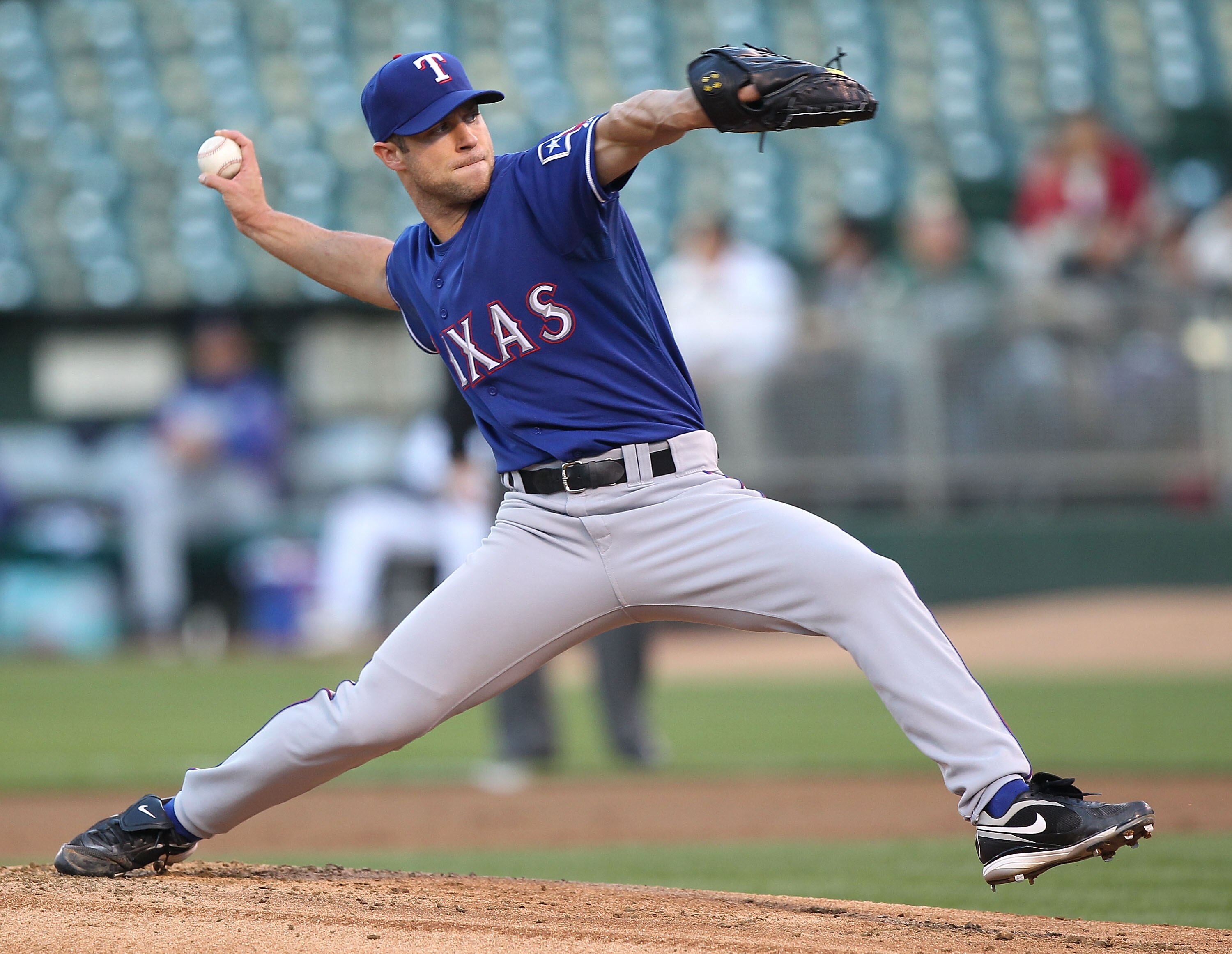 OAKLAND, CA - MAY 3:  Rich Harden #40 of the Texas Rangers pitches against the Oakland Athletics during an MLB game at the Oakland-Alameda County Coliseum on May 3, 2010 in Oakland, California. (Photo by Jed Jacobsohn/Getty Images)