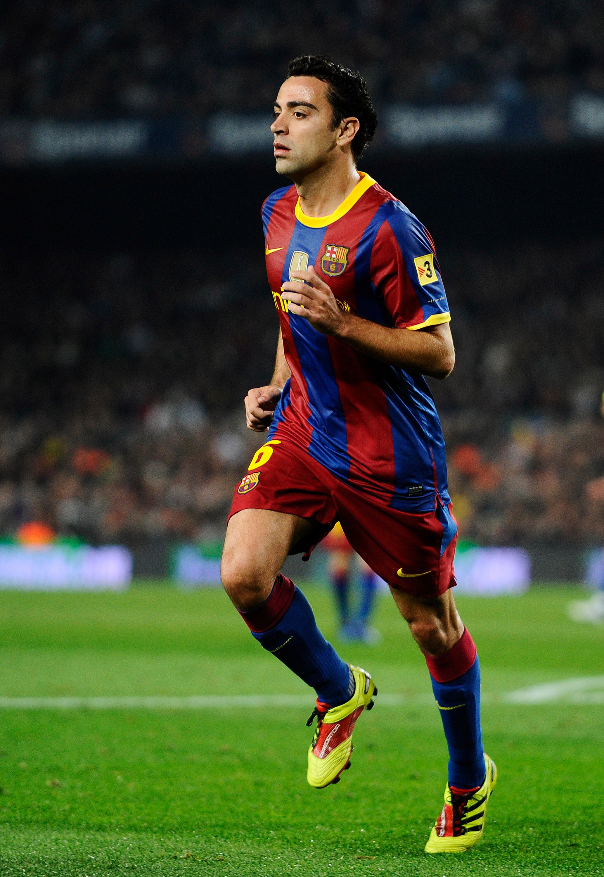 BARCELONA, SPAIN - NOVEMBER 13:  Xavi Hernandez of Barcelona runs during the La Liga match between Barcelona and Villarreal CF at Camp Nou Stadium on November 13, 2010 in Barcelona, Spain. Barcelona won the match 3-1.  (Photo by David Ramos/Getty Images)