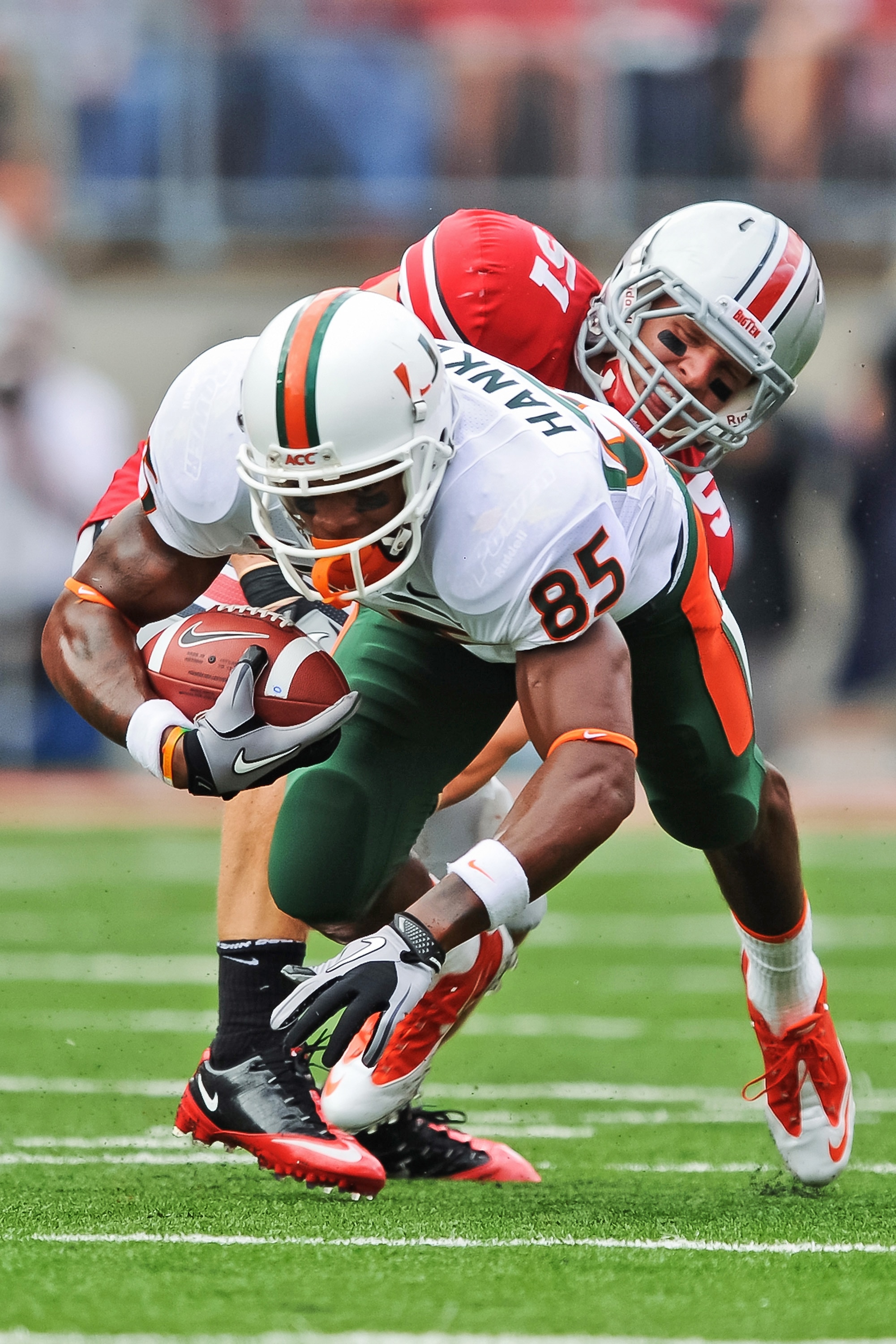 COLUMBUS, OH - SEPTEMBER 11:  Ross Homan #51 of the Ohio State Buckeyes tackles Leonard Hankerson #85 of the Miami Hurricanes at Ohio Stadium on September 11, 2010 in Columbus, Ohio.  (Photo by Jamie Sabau/Getty Images)