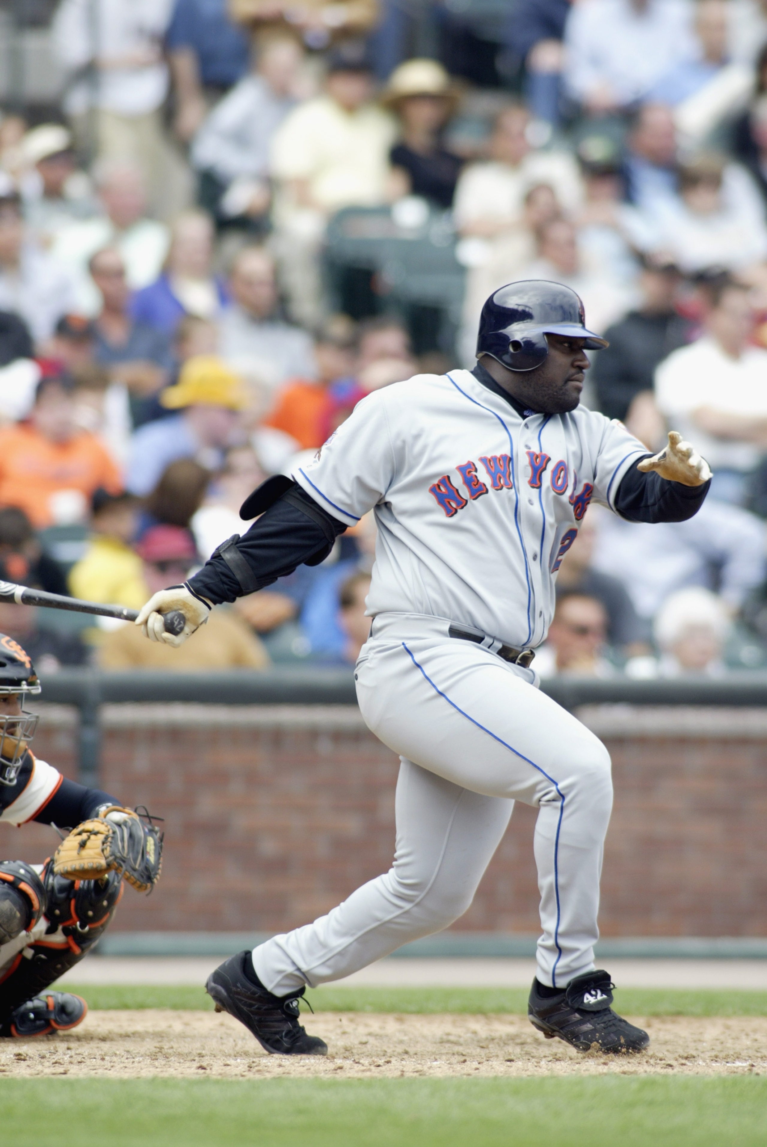 SAN FRANCISCO - AUGUST 22:  First baseman Mo Vaughn #42 of the New York Mets swings at the pitch during the MLB game against the San Francisco Giants on August 22, 2002 at Pacific Bell Park in San Francisco, California.  The Giants won 3-1. (Photo by Jed