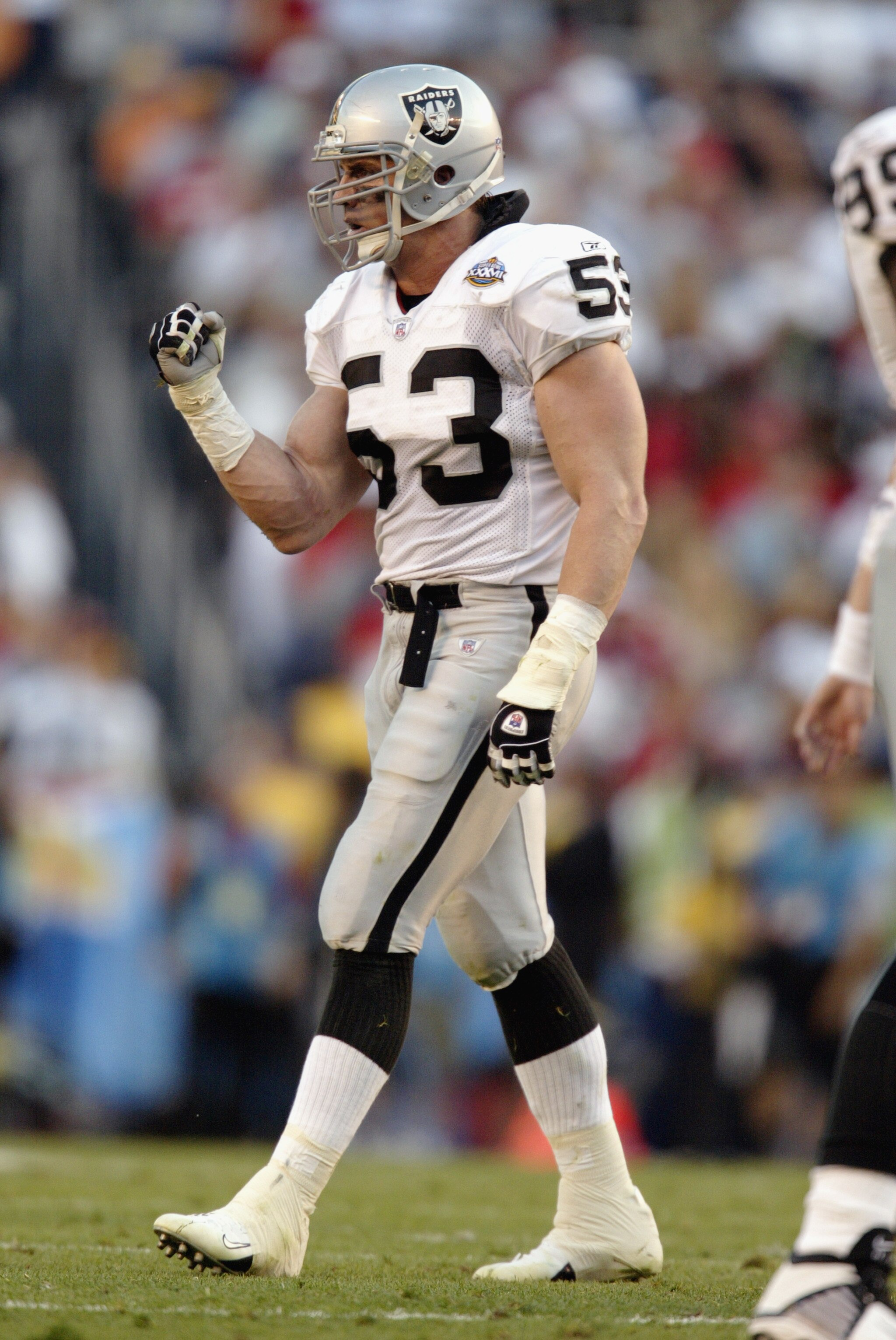 SAN DIEGO - JANUARY 26:  Bill Romanowski #53 of the Oakland Raiders celebrates after the play against the Tampa Bay Buccaneers during Super Bowl XXXVII on January 26, 2003 at Qualcomm Stadium in San Diego, California.  The Buccaneers defeated the Raiders