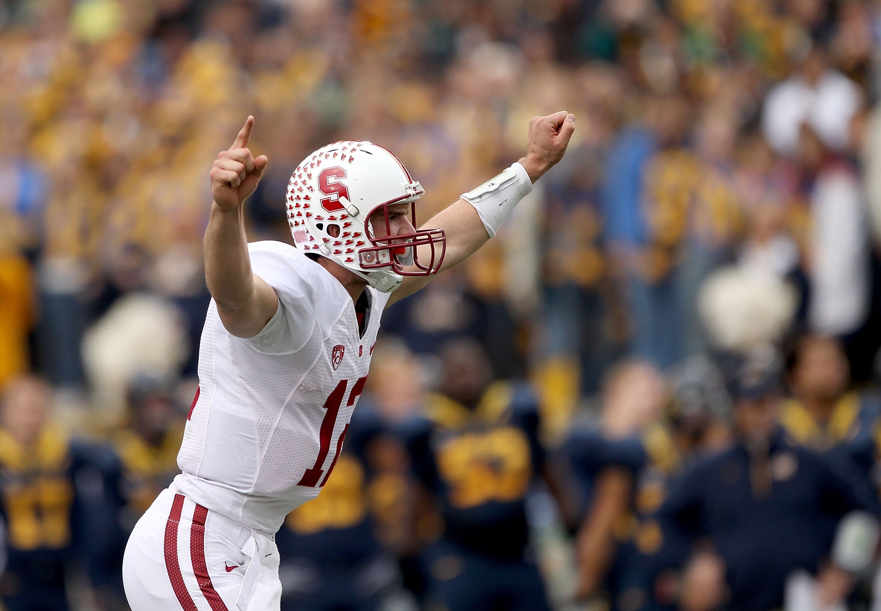 BERKELEY, CA - NOVEMBER 20:  Andrew Luck #12 of the Stanford Cardinal celebrates after the Cardinal scored a touchdown against the California Golden Bears at California Memorial Stadium on November 20, 2010 in Berkeley, California.  (Photo by Ezra Shaw/Ge