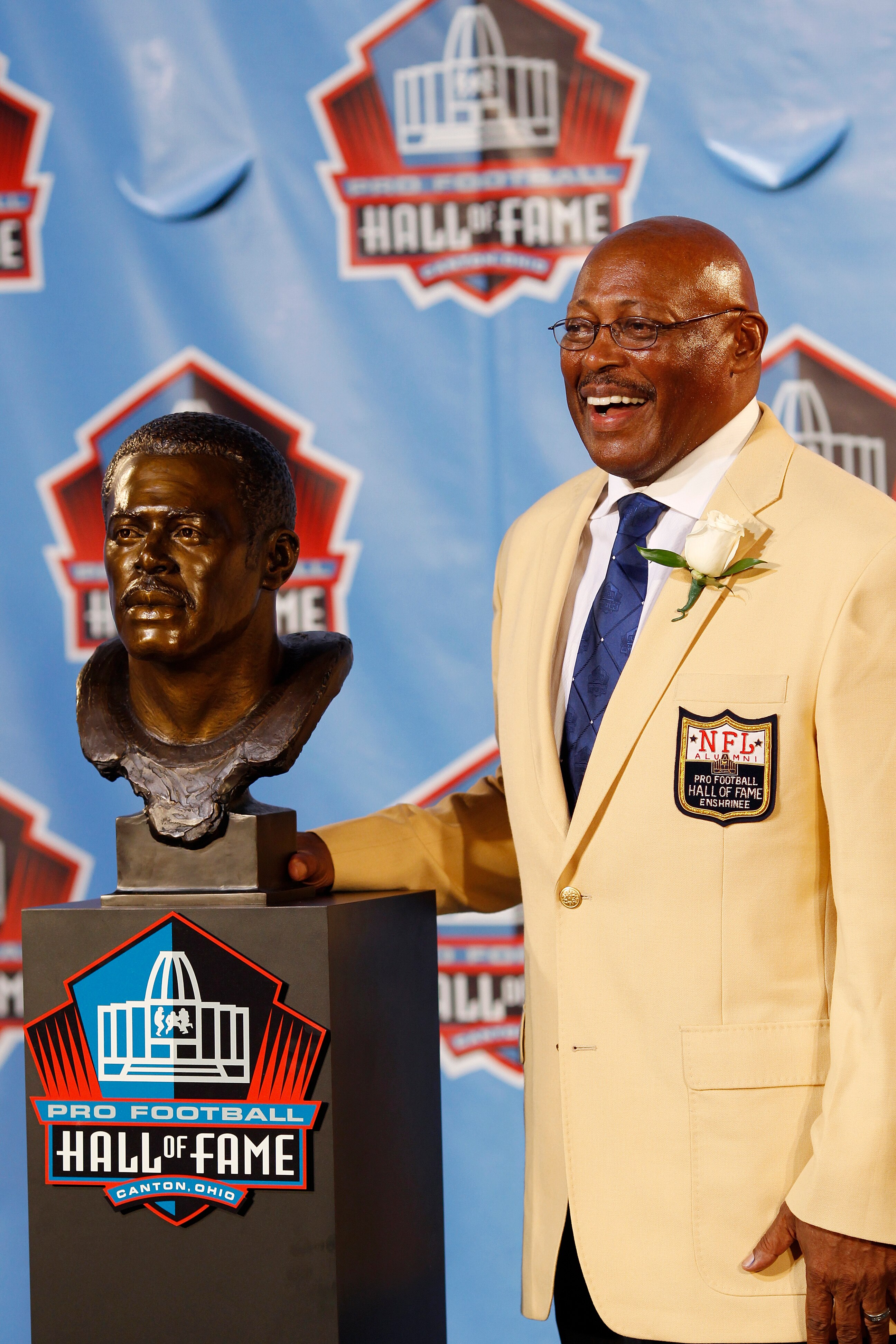 CANTON, OH - AUGUST 7: Floyd Little poses with his bust during the 2010 Pro Football Hall of Fame Enshrinement Ceremony at the Pro Football Hall of Fame Field at Fawcett Stadium on August 7, 2010 in Canton, Ohio. (Photo by Joe Robbins/Getty Images)