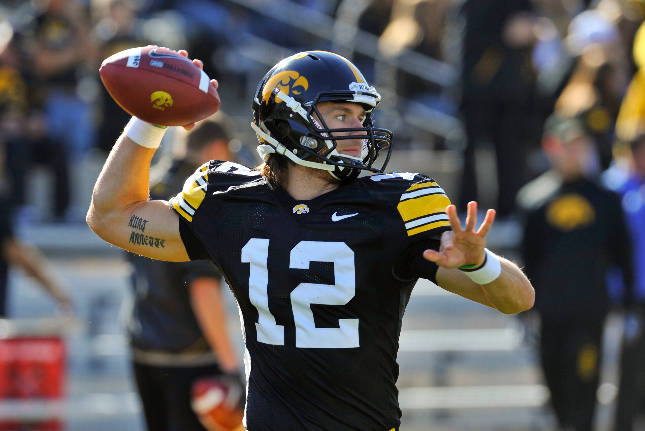IOWA CITY, IA - OCTOBER 30- Quarterback Ricky Stanzi #12 of the University of Iowa Hawkeyes warms up his throwing arm before play against the Michigan State Spartans at Kinnick Stadium on October 30, 2010 in Iowa City, Iowa. Iowa won 37-6 over Michigan St IOWA CITY, IA - OCTOBER 30- Quarterback Ricky Stanzi #12 of the University of Iowa Hawkeyes warms up his throwing arm before play against the Michigan State Spartans at Kinnick Stadium on October 30, 2010 in Iowa City, Iowa. Iowa won 37-6 over Michigan St