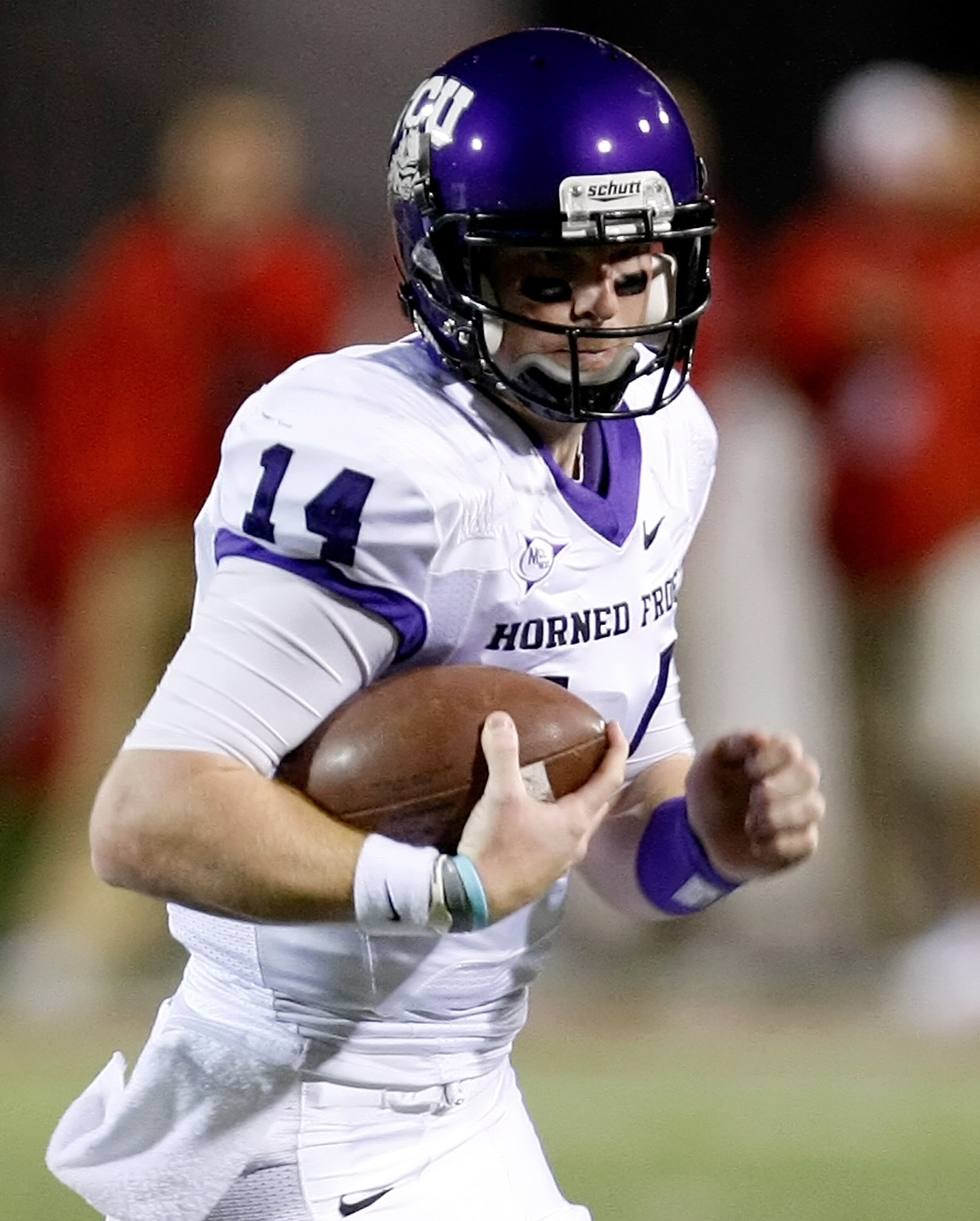 LAS VEGAS - OCTOBER 30:  Quarterback Andy Dalton #14 of the Texas Christian University Horned Frogs runs for yardage against the UNLV Rebels at Sam Boyd Stadium October 30, 2010 in Las Vegas, Nevada. TCU won 48-6.  (Photo by Ethan Miller/Getty Images)
