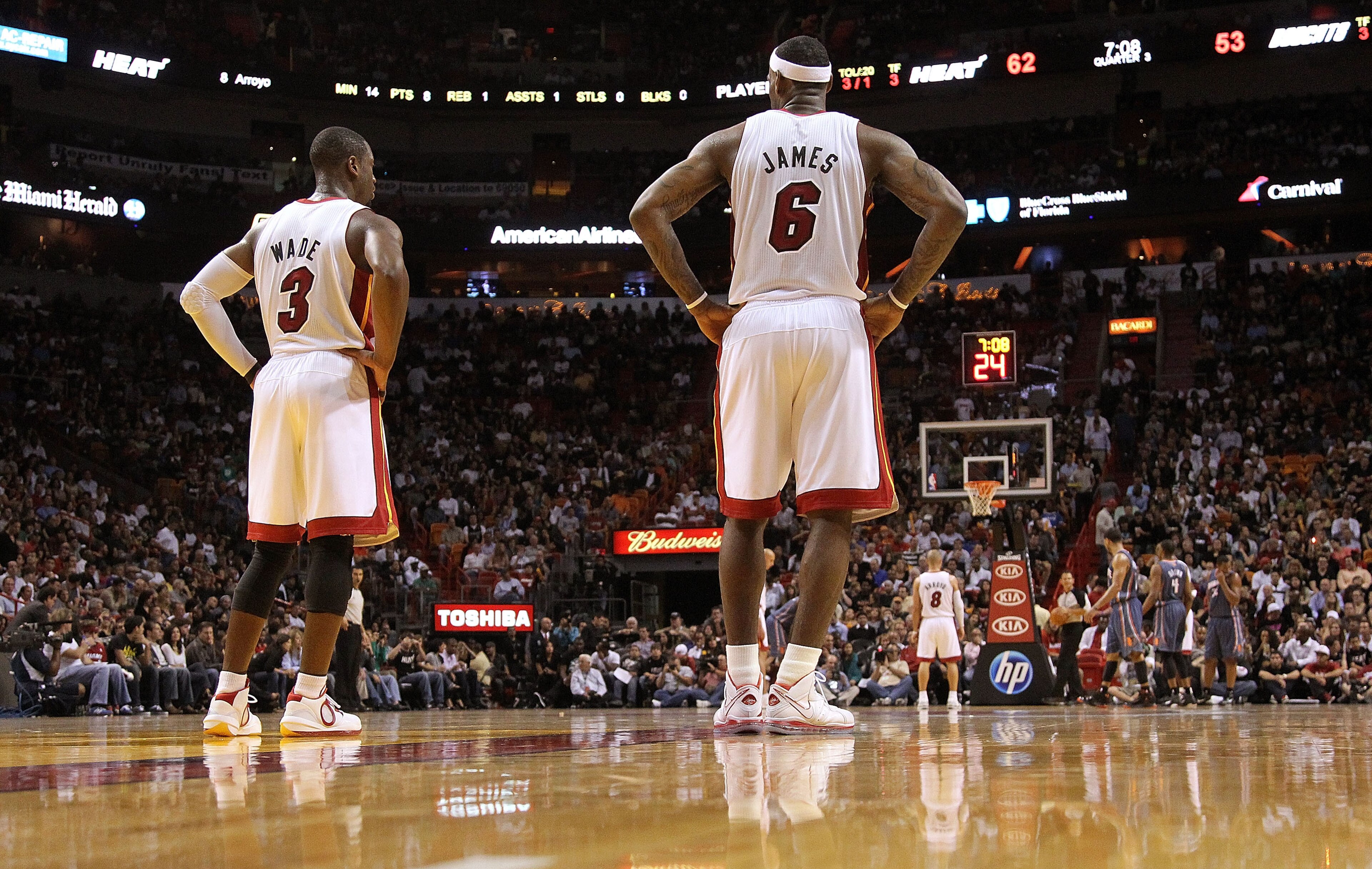 MIAMI - NOVEMBER 19:  Dwyane Wade #3 and LeBron James #6 of the Miami Heat look on during a game against the Charlotte Bobcats at American Airlines Arena on November 19, 2010 in Miami, Florida. NOTE TO USER: User expressly acknowledges and agrees that, by