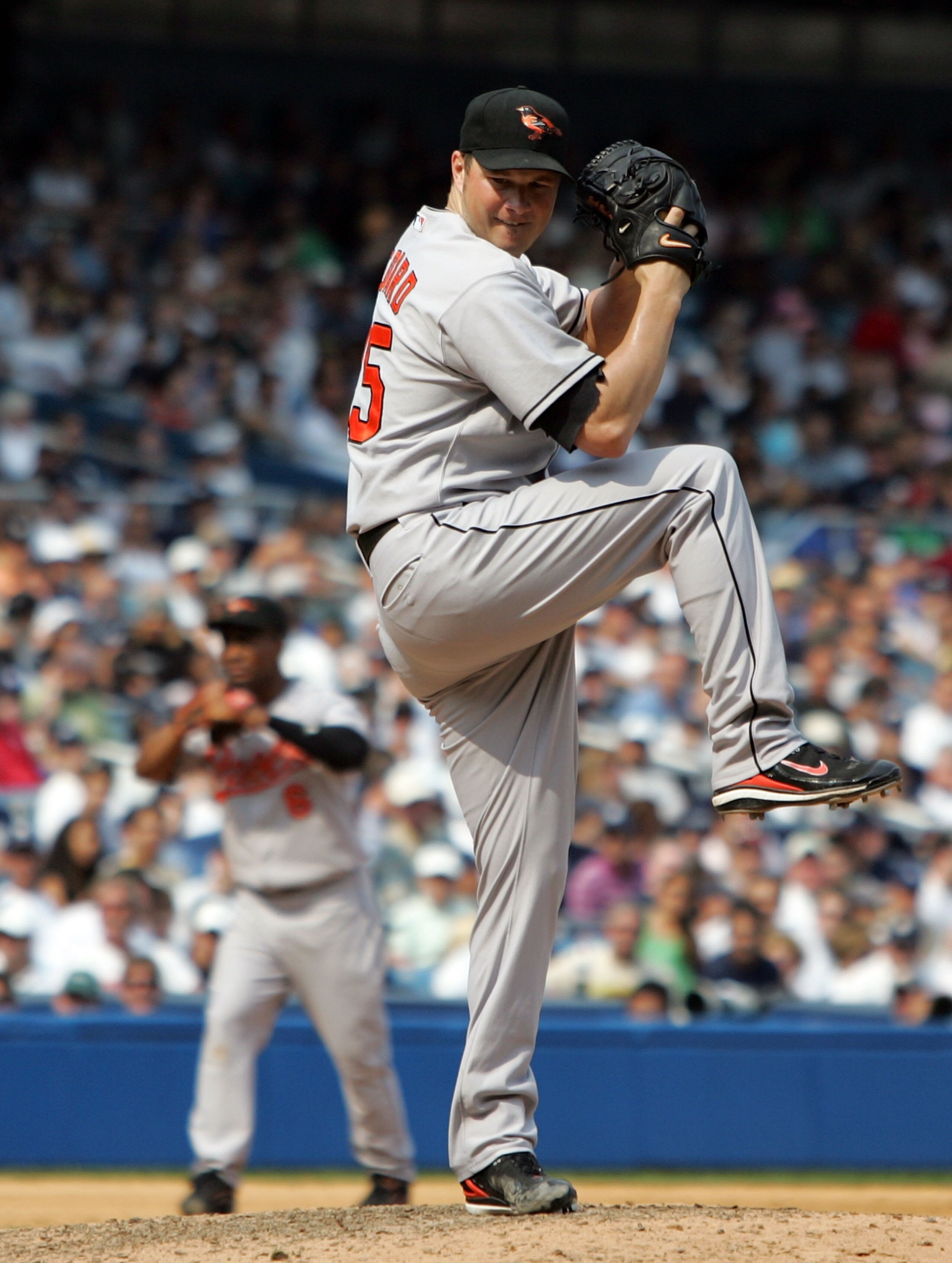 NEW YORK - AUGUST 15:  Erik Bedard #45 of the Baltimore Orioles pitches against the New York Yankees during their game at Yankee Stadium on August 15, 2007 in the Bronx borough of New York City.The Orioles defeated the Yankees 6-3 in ten innings.  (Photo 