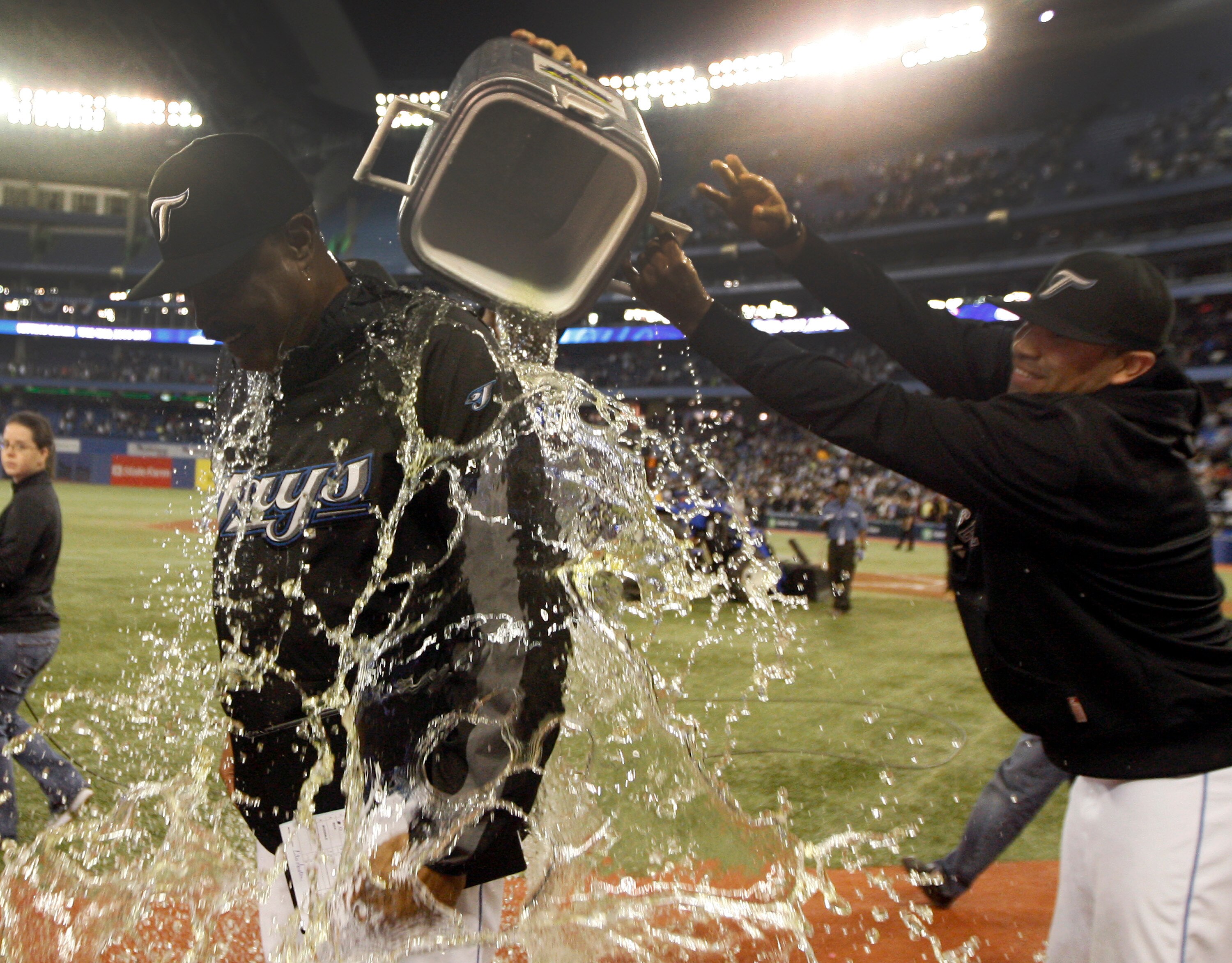 TORONTO, ON - SEPTEMBER 29:  Ricky Romero #24 (R) pours gatorade over Manager Cito Gaston after the Toronto Blue Jays defeated the the New York Yankees 8-4 during a MLB game at the Rogers Centre September 29, 2010 in Toronto, Ontario, Canada. (Photo by Ab