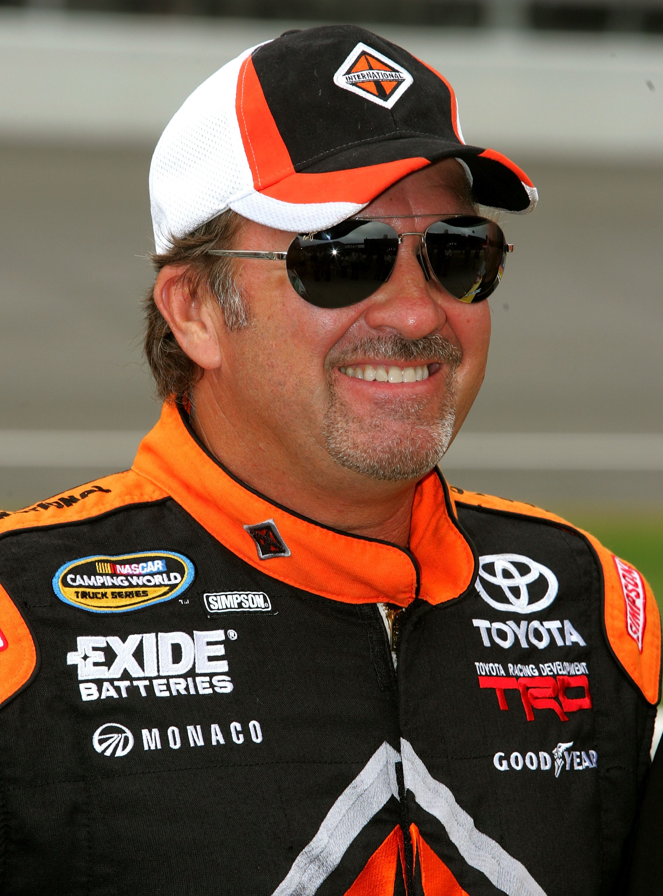 BROOKLYN, MI - JUNE 12:  Mike SKinner, driver of the #5 International Trucks/Monaco RV Toyota, stands on the grid prior to the NASCAR Camping World Truck Series VFW 200 at Michigan International Speedway on June 12, 2010 in Brooklyn, Michigan.  (Photo by