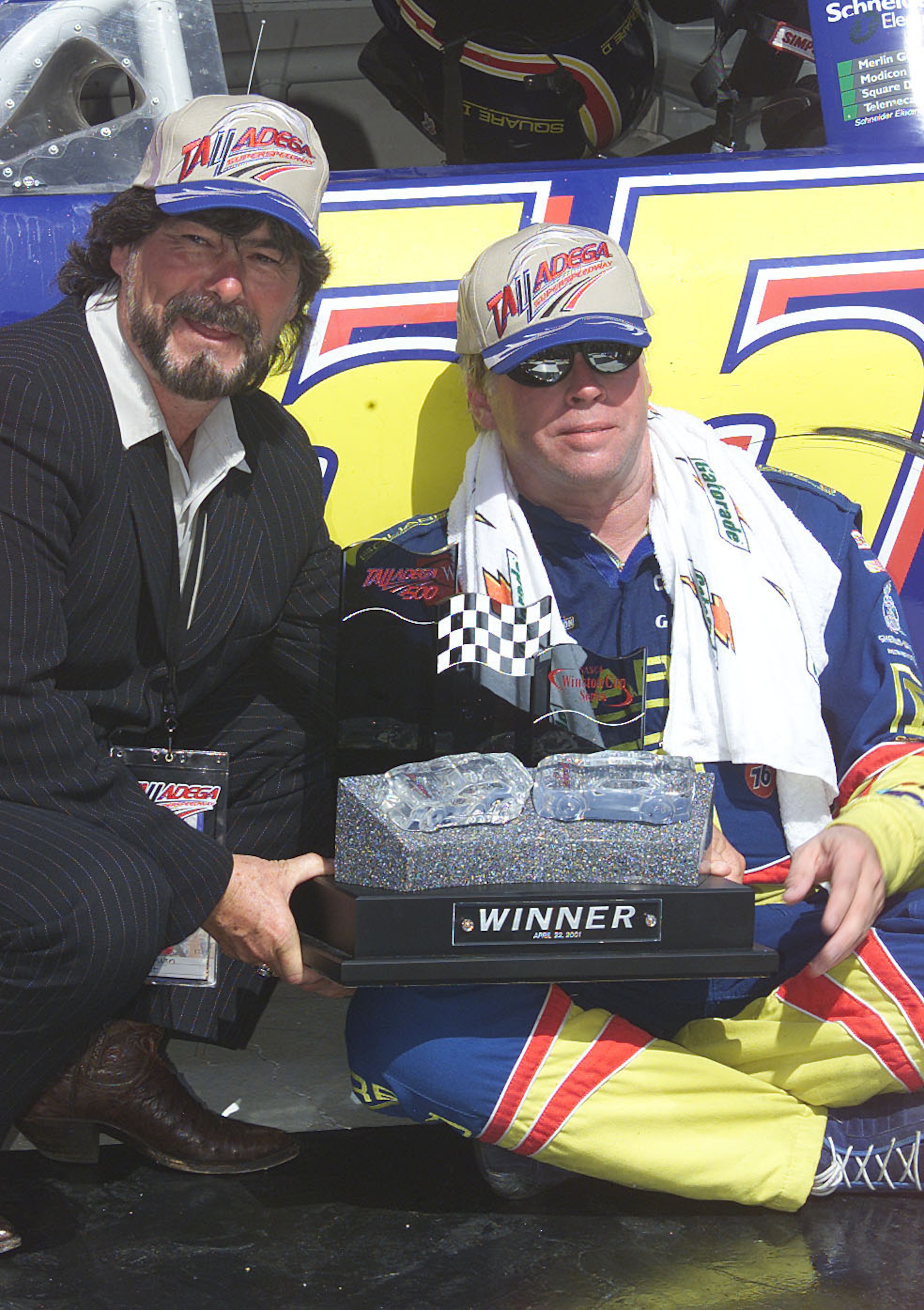 22 Apr 2001: Bobby Hamilton driving the #55 Square D Chevrolet receives the victors trophy from Country Music Legend Randy Owen after the NASCAR Winston Cup Talladega 500 at the Talladega Super Speedway, Talladega, Alabama.  <<Digital Image>> Mandatory Cr