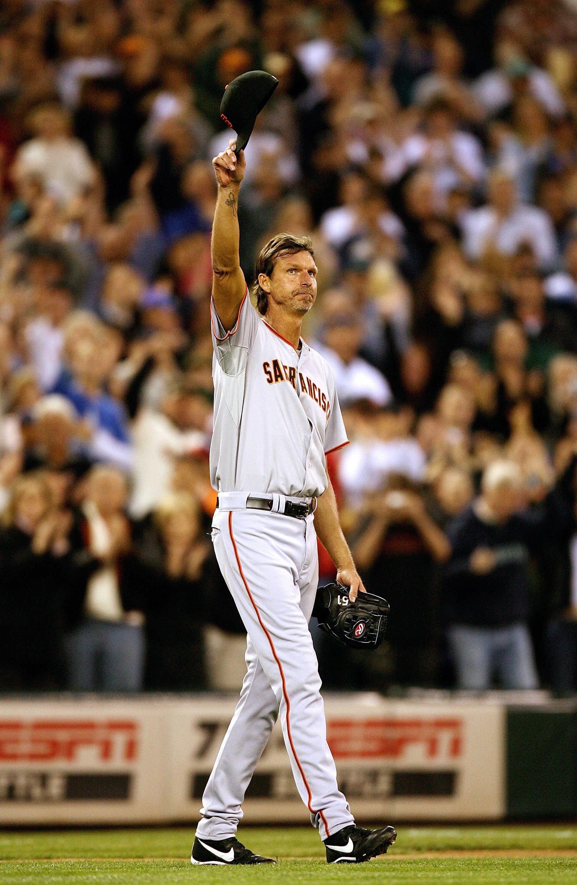 SEATTLE  - MAY 22:  Starting pitcher Randy Johnson #51 of the San Francisco Giants acknowledges the crowd after coming out of the game in the sixth inning against the Seattle Mariners on May 22, 2009 in Seattle, Washington. (Photo by Otto Greule Jr/Getty