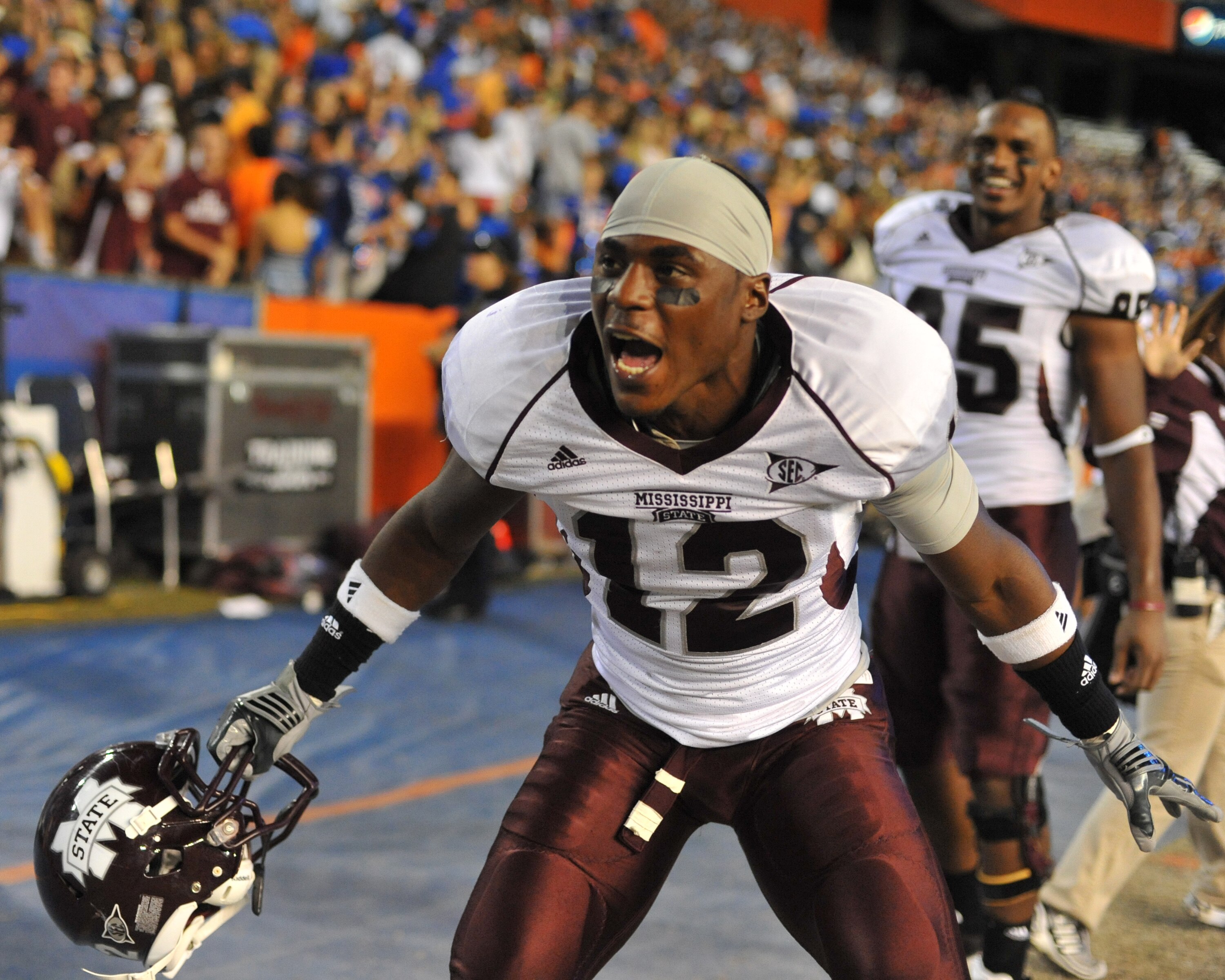 GAINESVILLE, FL - OCTOBER 16: Defensive back Dennis Thames #12 of the Mississippi State Bulldogs celebrates a 10 - 7 victory against the Florida Gators October 16, 2010 Ben Hill Griffin Stadium at Gainesville, Florida. (Photo by Al Messerschmidt/Getty I GAINESVILLE, FL - OCTOBER 16: Defensive back Dennis Thames #12 of the Mississippi State Bulldogs celebrates a 10 - 7 victory against the Florida Gators October 16, 2010 Ben Hill Griffin Stadium at Gainesville, Florida. (Photo by Al Messerschmidt/Getty I