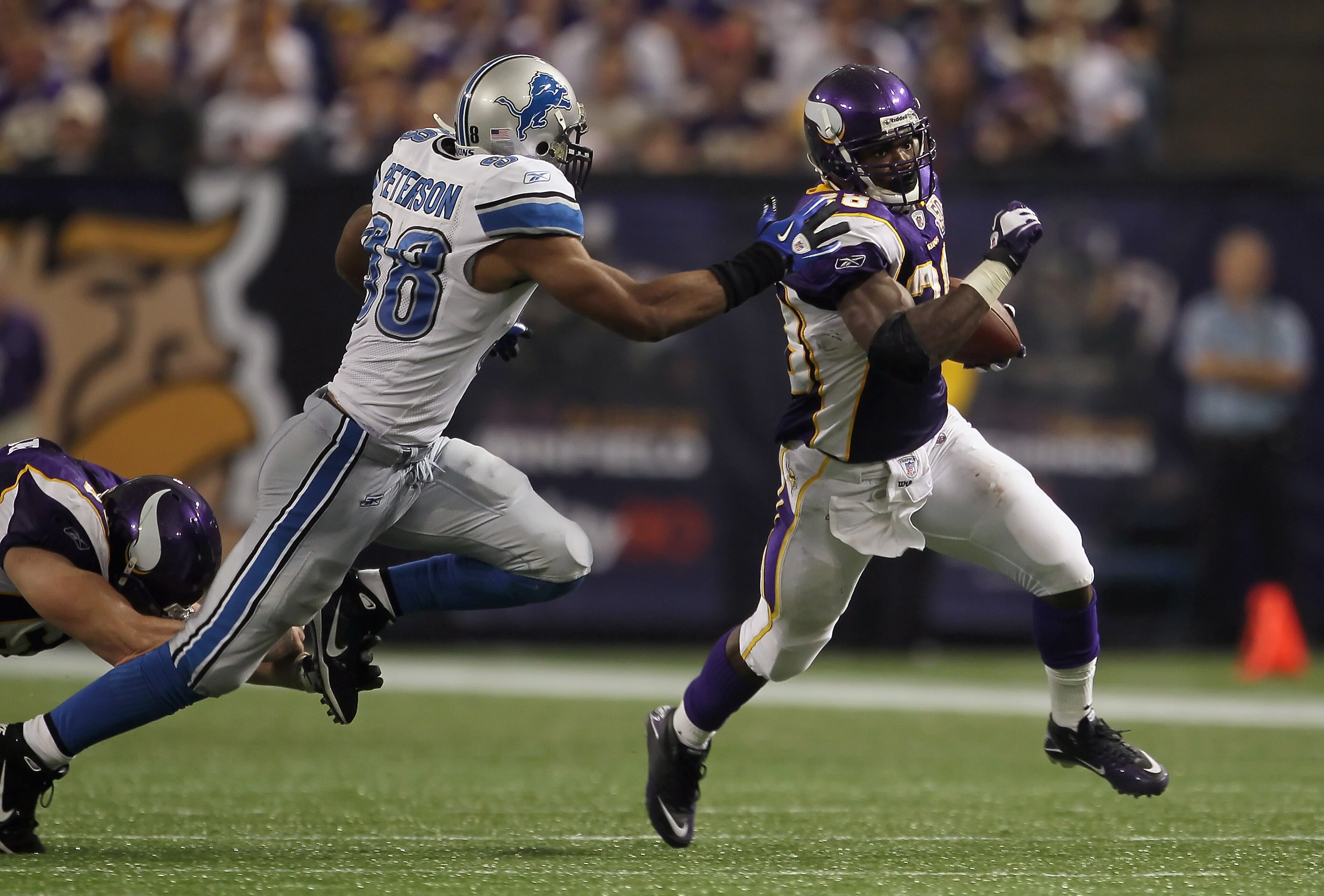 MINNEAPOLIS - SEPTEMBER 26:  Running back Adrian Peterson #28 of the Minnesota Vikings carries the ball against the Detroit Lions at Mall of America Field on September 26, 2010 in Minneapolis, Minnesota. The Vikings defeated the Lions 24-10.  (Photo by Je