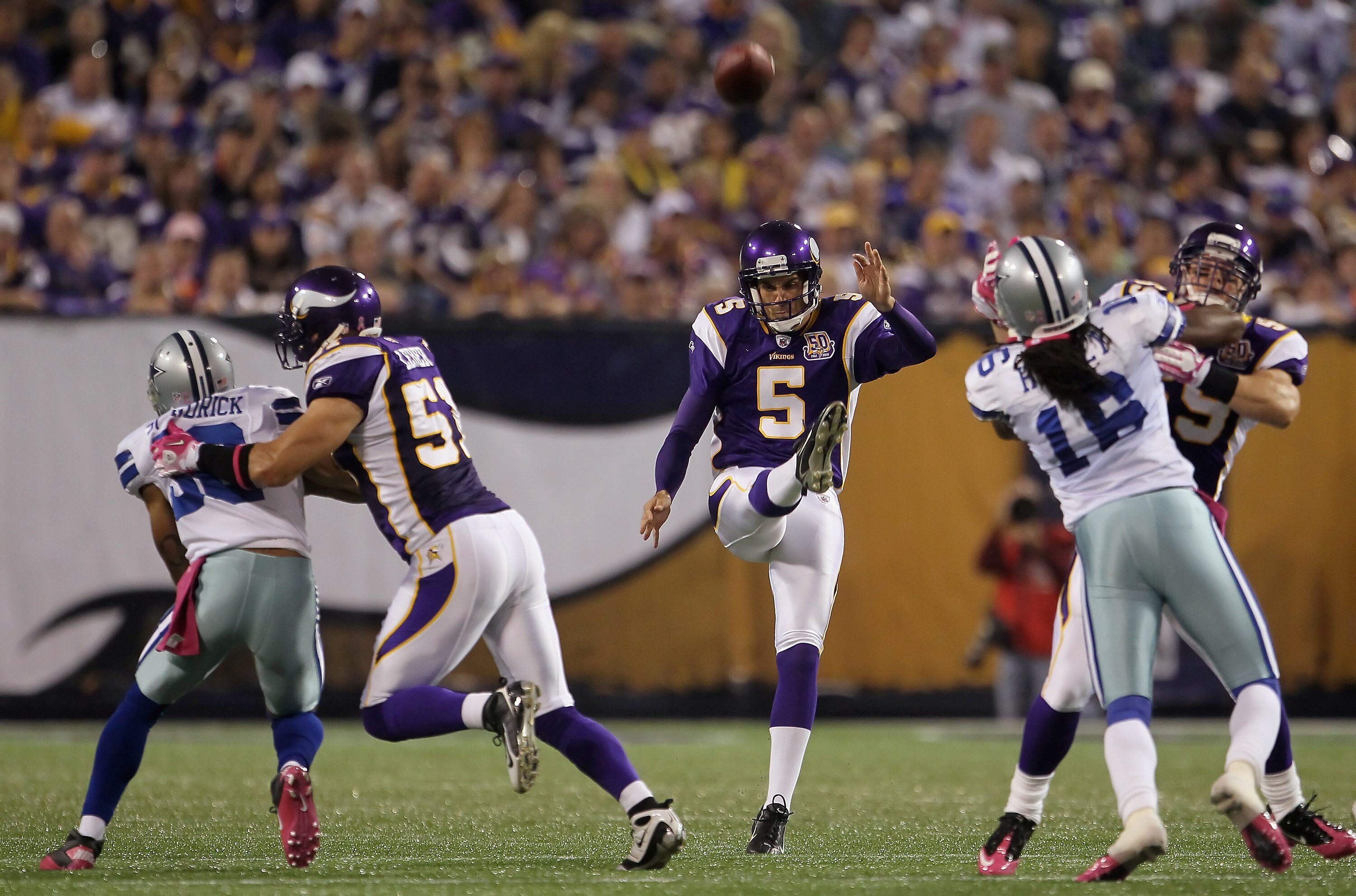 MINNEAPOLIS - OCTOBER 17:  Chris Kluwe #5 of the Minnesota Vikings kicks during the game at Mall of America Field on October 17, 2010 in Minneapolis, Minnesota.  (Photo by Jeff Gross/Getty Images)