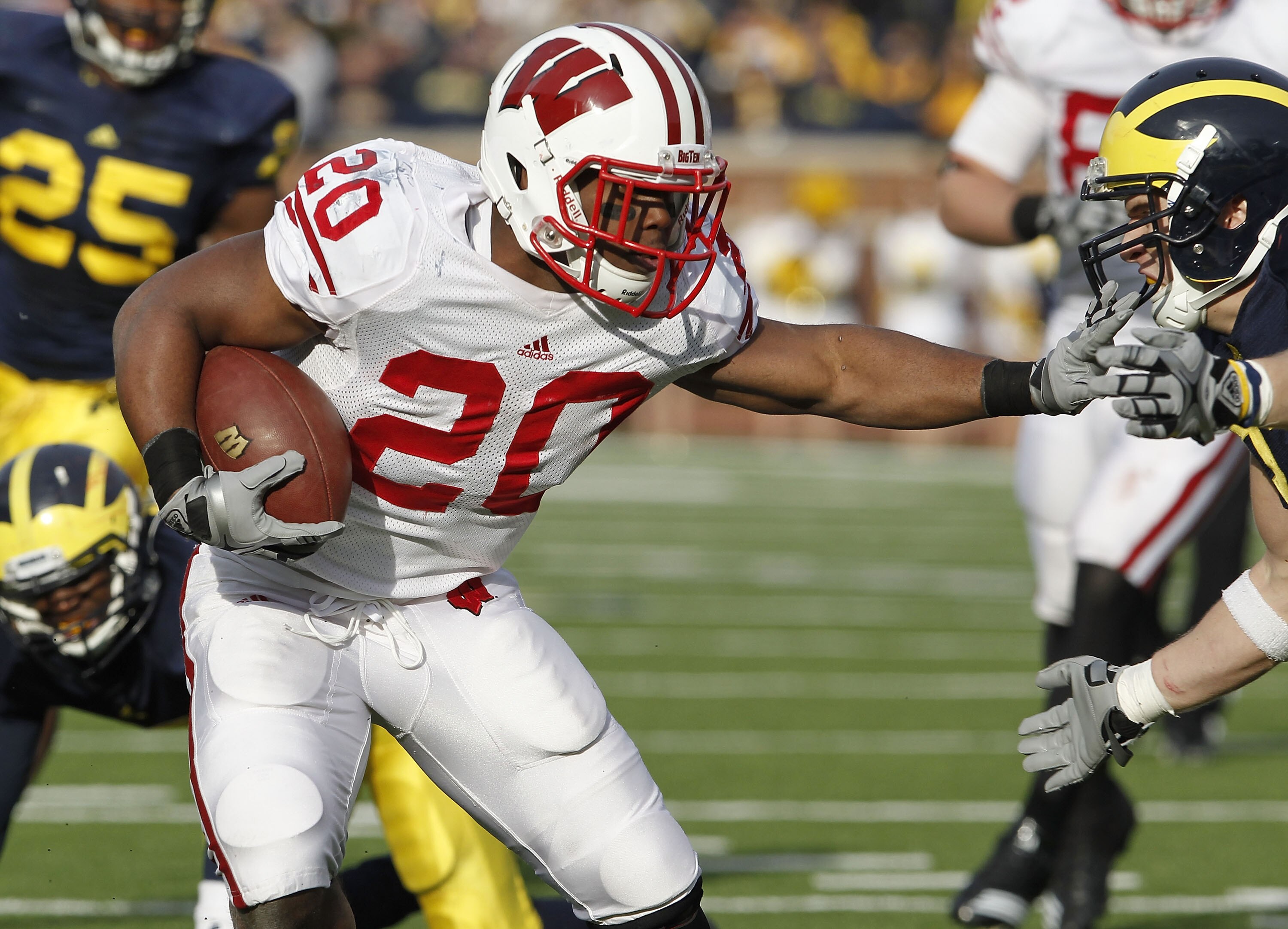 ANN ARBOR, MI - NOVEMBER 20: James White #20 of the Wisconsin Badgers looks for running room while playing the Michigan Wolverines at Michigan Stadium on November 20, 2010 in Ann Arbor, Michigan. Wisconson won the game 48-28. (Photo by Gregory Shamus/Ge ANN ARBOR, MI - NOVEMBER 20: James White #20 of the Wisconsin Badgers looks for running room while playing the Michigan Wolverines at Michigan Stadium on November 20, 2010 in Ann Arbor, Michigan. Wisconson won the game 48-28. (Photo by Gregory Shamus/Ge