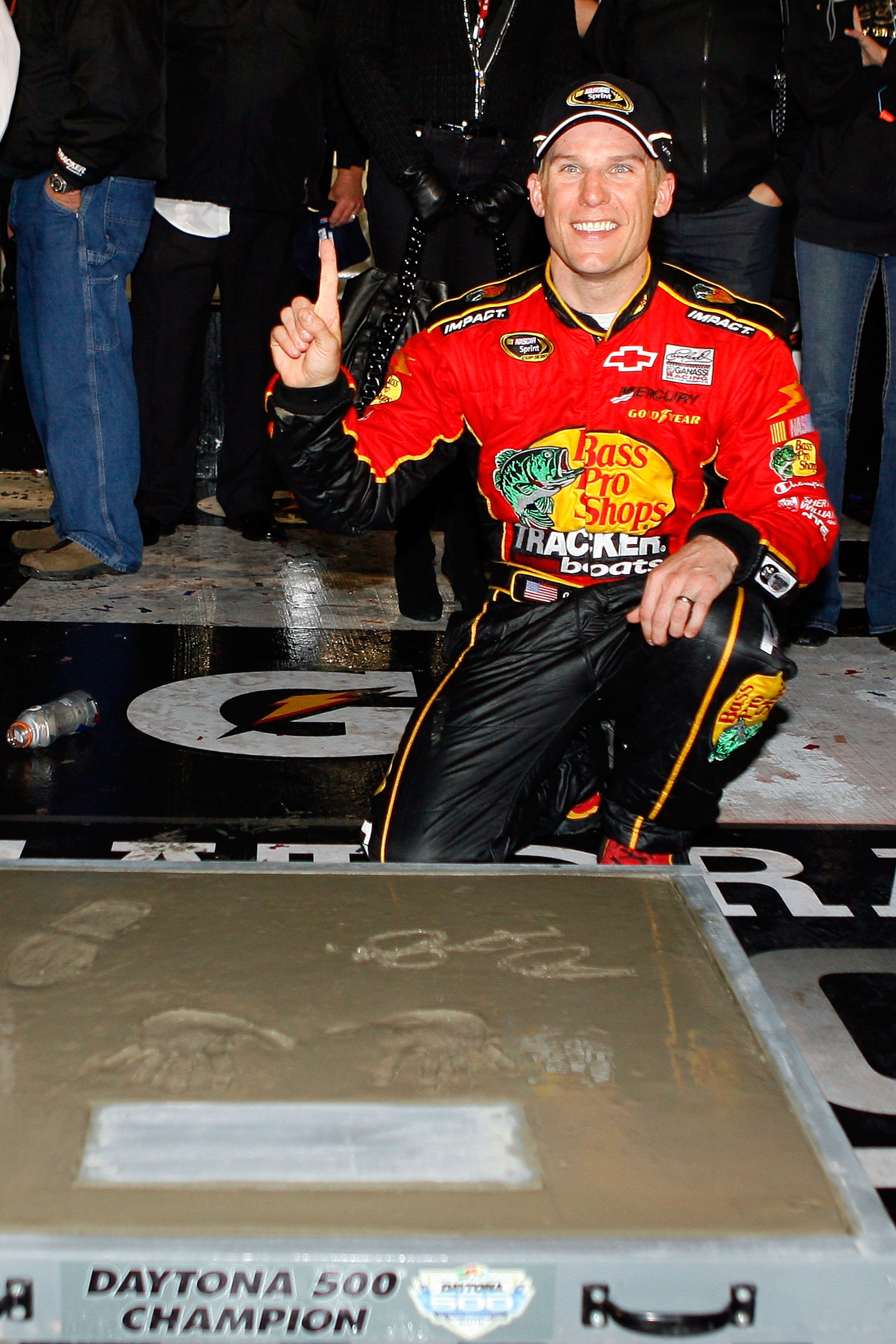 DAYTONA BEACH, FL - FEBRUARY 14:  Jamie McMurray, driver of the #1 Bass Pro Shops/Tracker Boats Chevrolet, celebrates in Victory Lane after winning the NASCAR Sprint Cup Series Daytona 500 at Daytona International Speedway on February 14, 2010 in Daytona