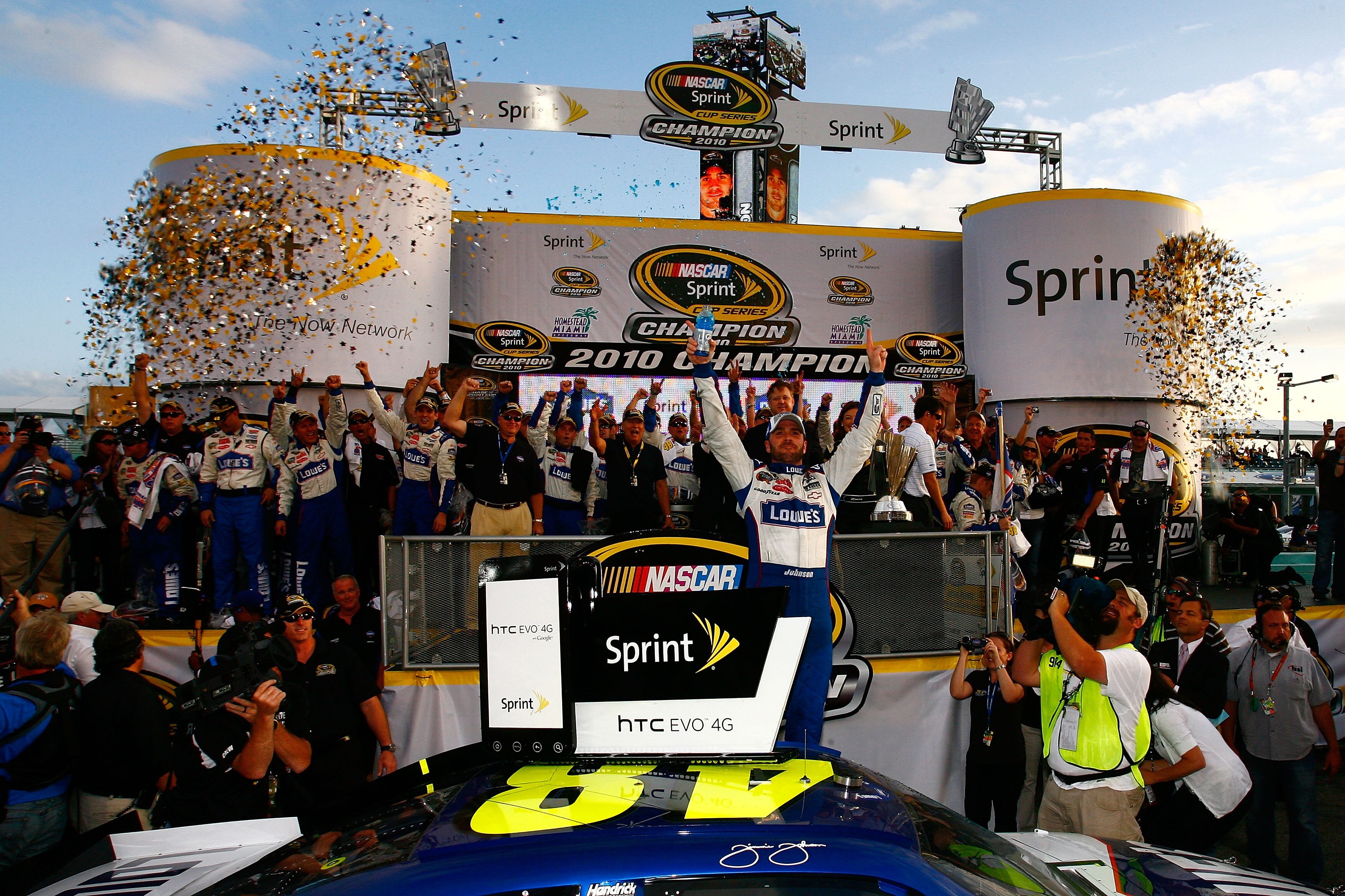 HOMESTEAD, FL - NOVEMBER 21:  Jimmie Johnson, driver of the #48 Lowe's Chevrolet, celebrates after finishing in second place in the Ford 400 to clinch his fifth consecutive NASCAR Sprint Cup championship at Homestead-Miami Speedway on November 21, 2010 in