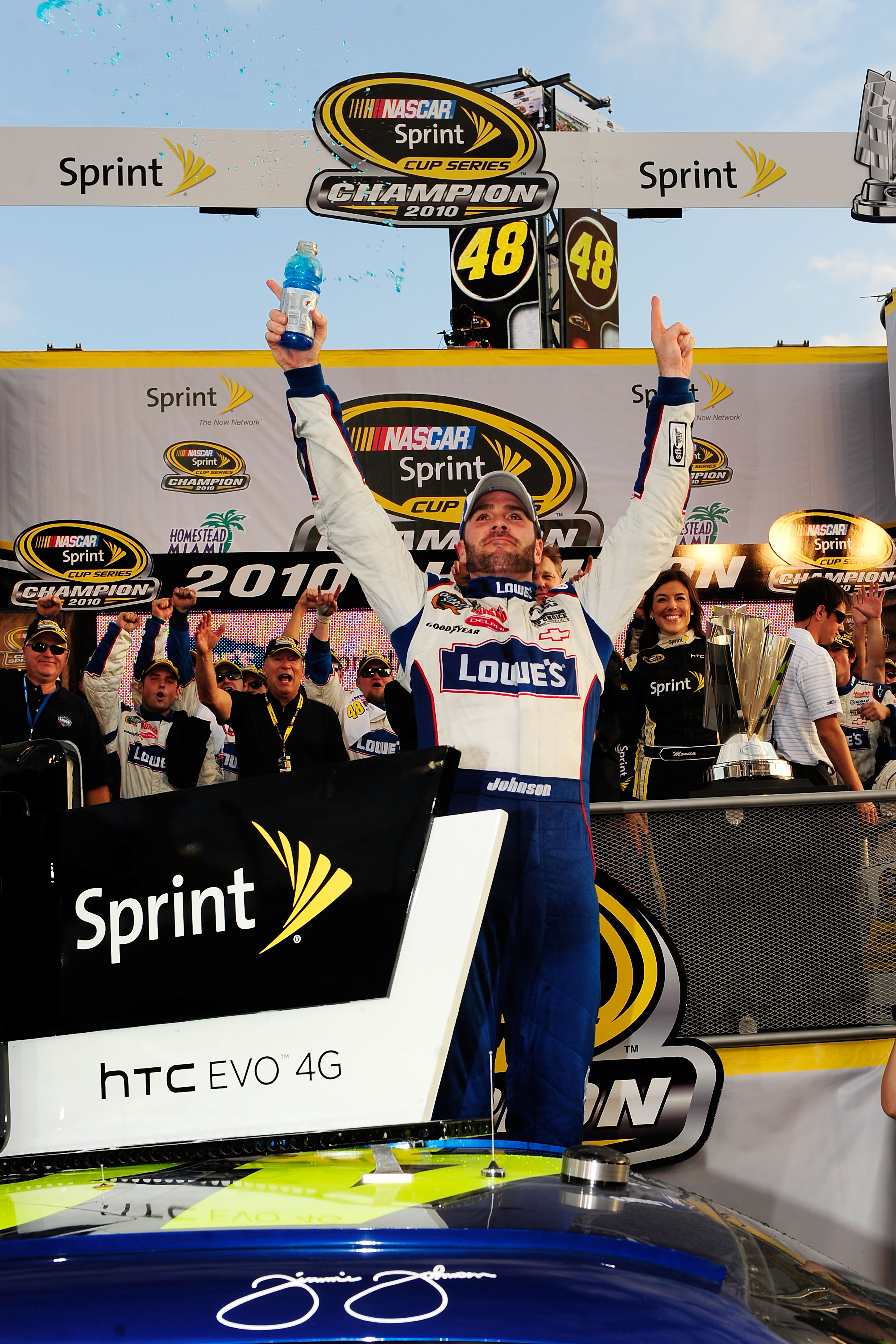 HOMESTEAD, FL - NOVEMBER 21:  Jimmie Johnson, driver of the #48 Lowe's Chevrolet, celebrates after finishing in second place in the Ford 400 to clinch his fifth consecutive NASCAR Sprint Cup championship at Homestead-Miami Speedway on November 21, 2010 in
