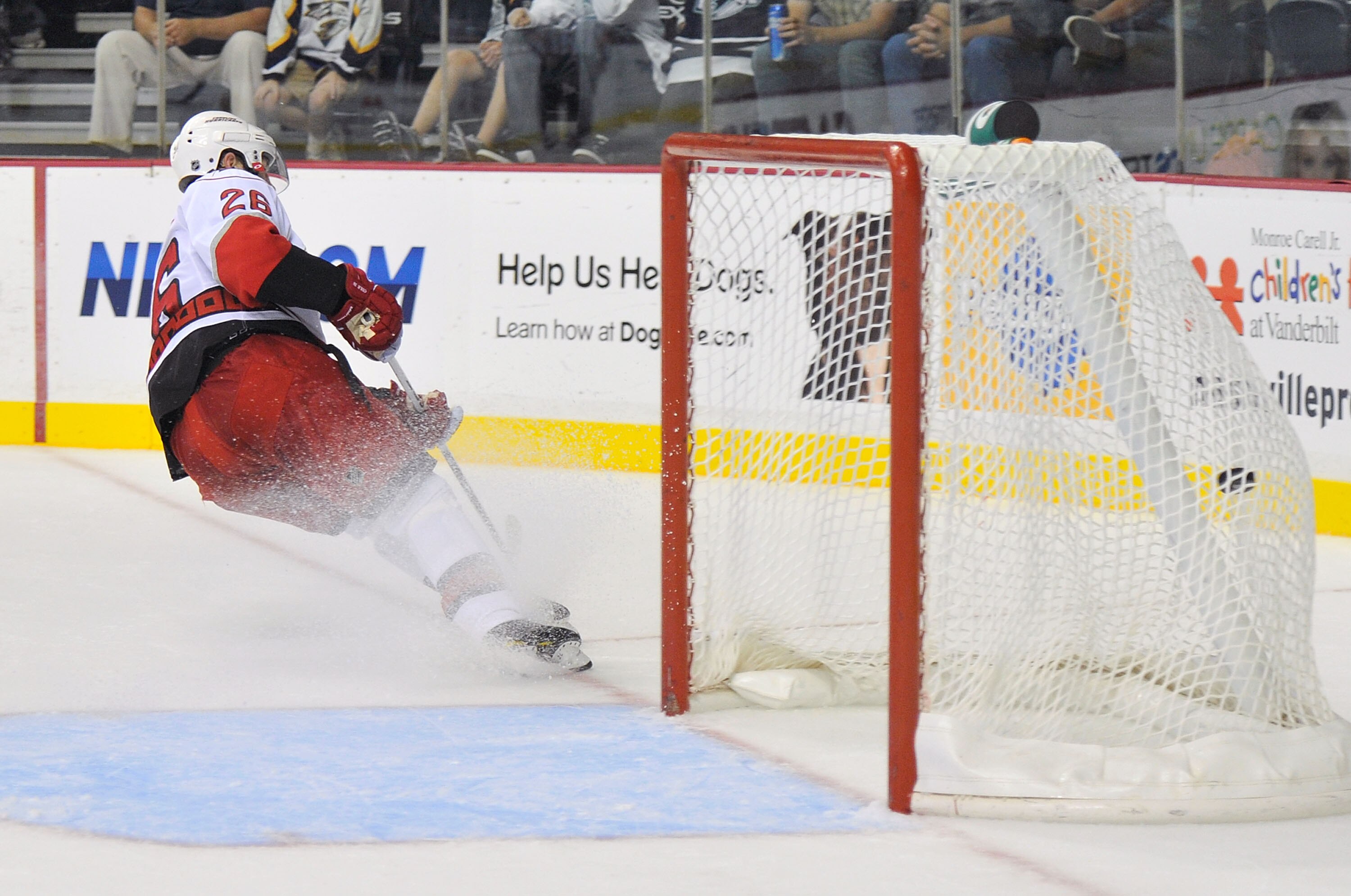 NASHVILLE, TN - SEPTEMBER 23:  Eric Cole #26 of the Carolina Hurricanes scores an empty net goal against the Nashville Predators at Bridgestone Arena on September 23, 2010 in Nashville, Tennessee.  (Photo by Frederick Breedon/Getty Images)