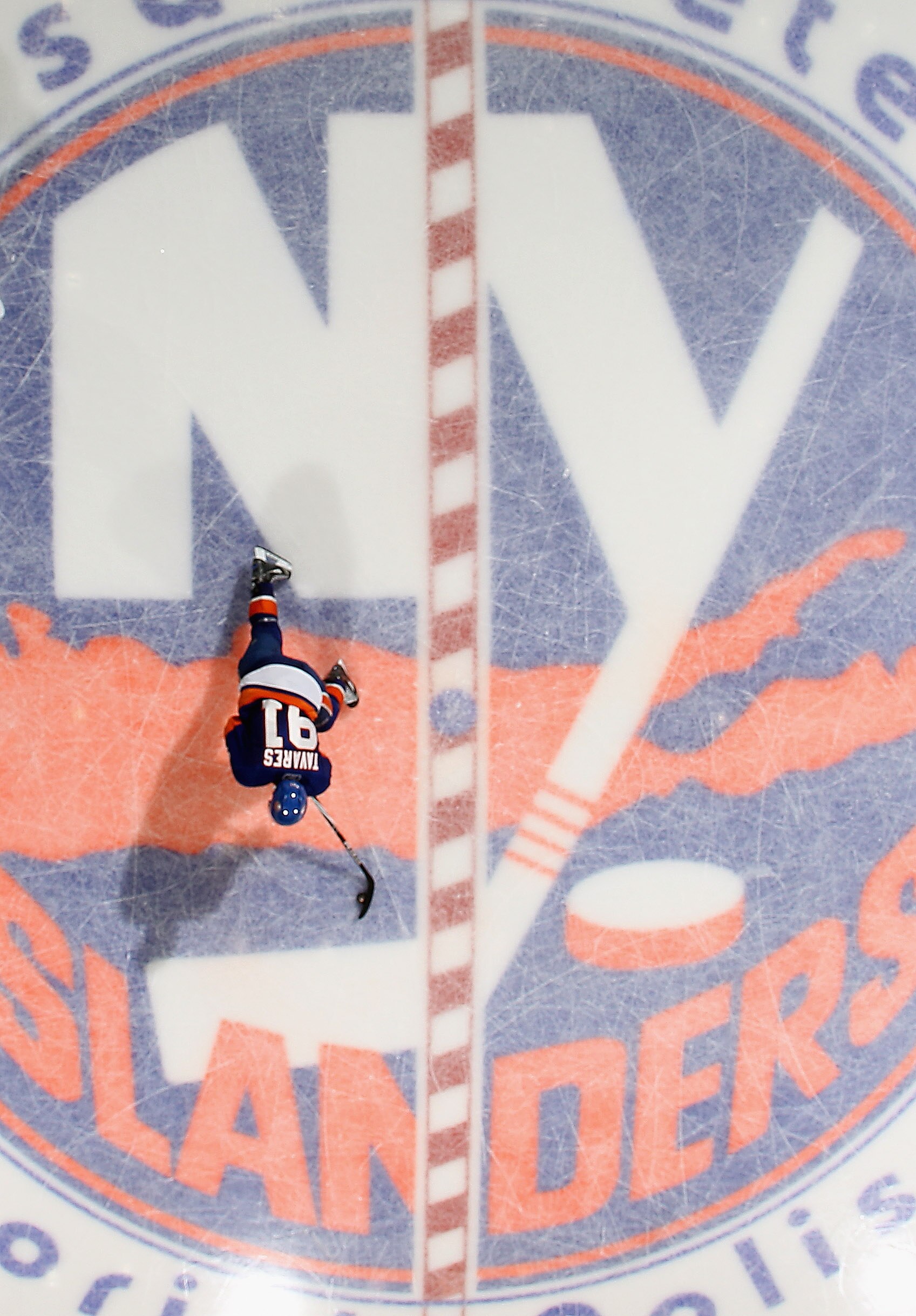 UNIONDALE, NY - NOVEMBER 17: John Tavares #91  of the New York Islanders skates against the Tampa Bay Lightning at the Nassau Coliseum on November 17, 2010 in Uniondale, New York. The Lightning defeated the Islanders 4-2. (Photo by Bruce Bennett/Getty Ima