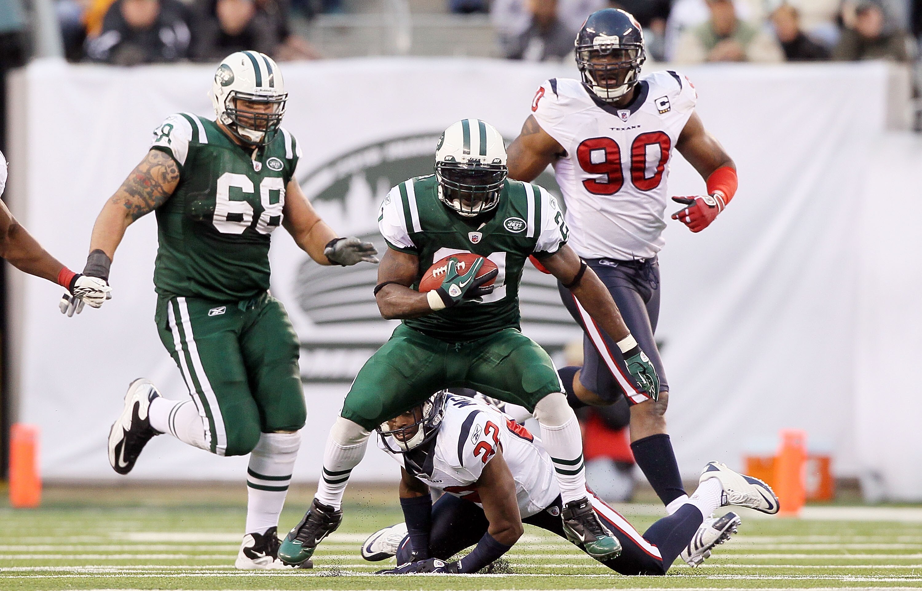 EAST RUTHERFORD, NJ - NOVEMBER 21:  LaDainian Tomlinson #21 of the New York Jets runs the ball against the Houston Texans on November 21, 2010 at the New Meadowlands Stadium in East Rutherford, New Jersey.  (Photo by Jim McIsaac/Getty Images)