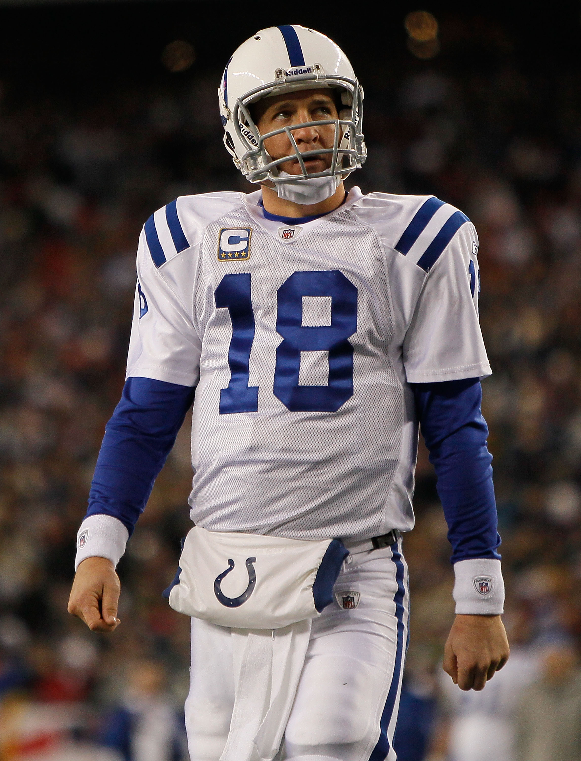 FOXBORO, MA - NOVERMBER 21:  Peyton Manning #18 of the Indianapolis Colts looks at the clock in the second half during a game against the New England Patriots reacts in the second half at Gillette Stadium on November 21, 2010 in Foxboro, Massachusetts. (P