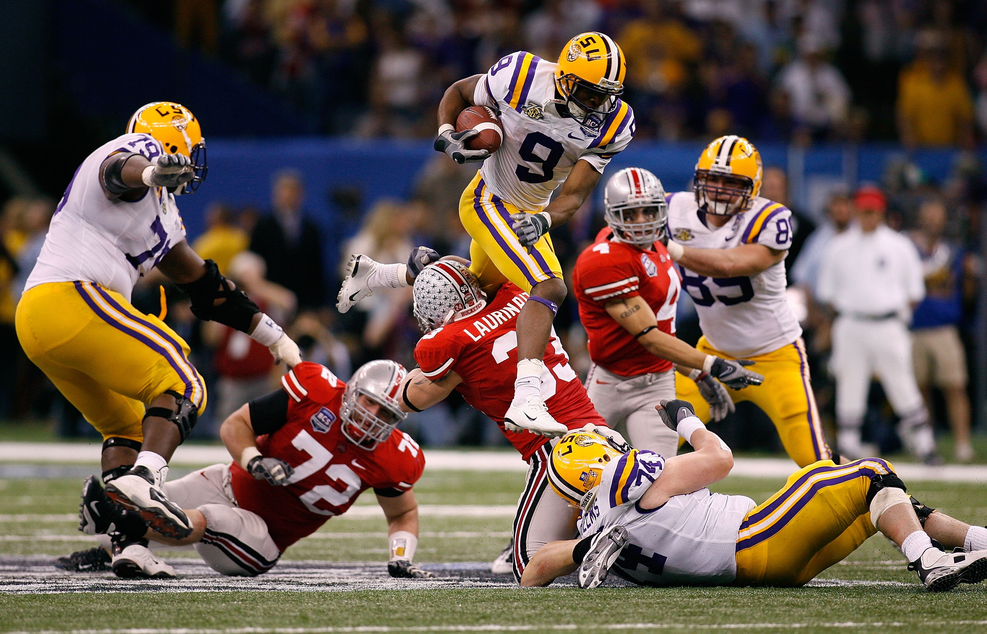 NEW ORLEANS - JANUARY 07:  Early Doucet #9 of of the Louisiana State University Tigers runs with the ball against the Ohio State Buckeyes during the AllState BCS National Championship on January 7, 2008 at the Louisiana Superdome in New Orleans, Louisiana