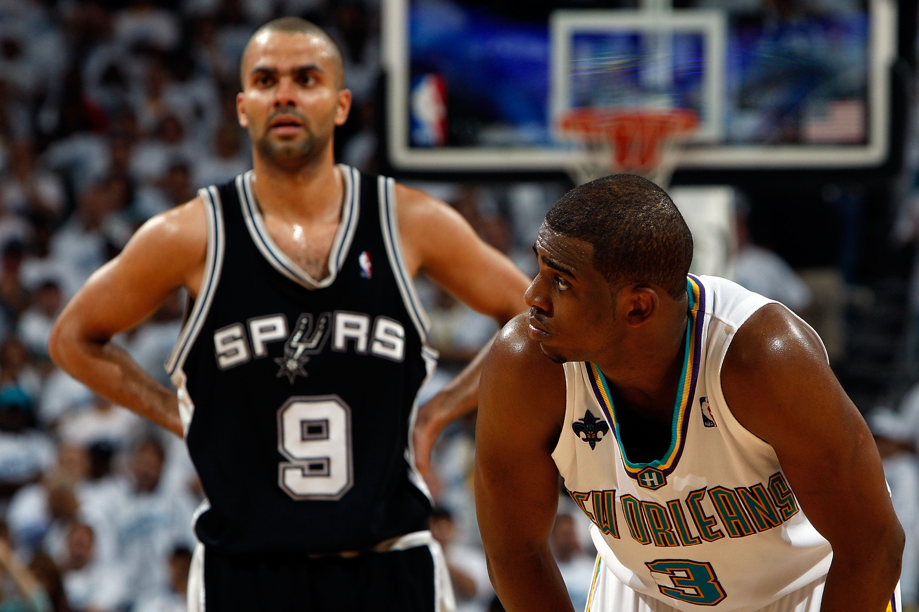 NEW ORLEANS - MAY 19:  Tony Parker #9 of the San Antonio Spurs waits for a free throw with Chris Paul #3 of the New Orleans Hornets in Game Seven of the Western Conference Semifinals during the 2008 NBA Playoffs at The New Orleans Arena on May 19, 2008 in