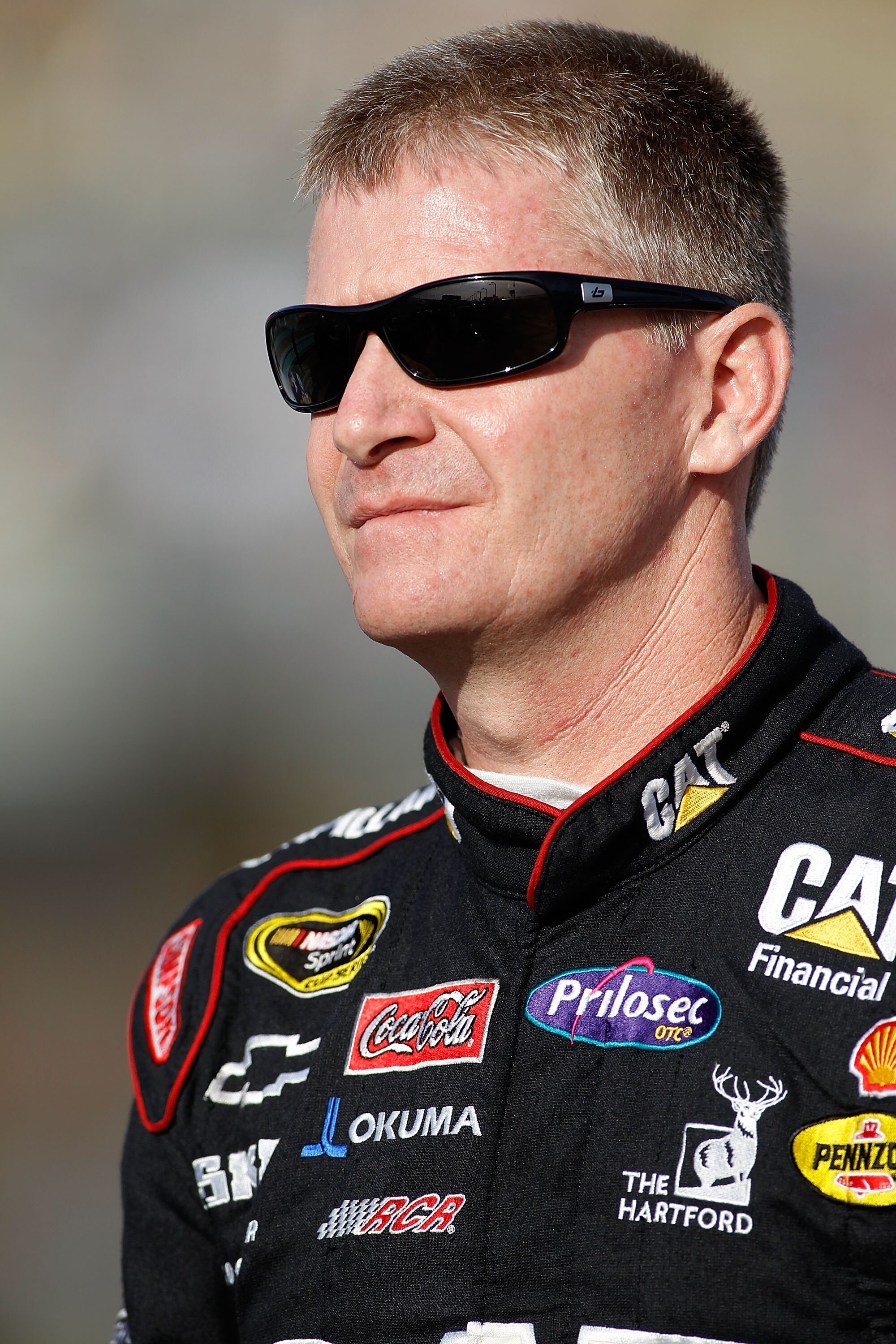 HOMESTEAD, FL - NOVEMBER 19:  Jeff Burton, driver of the #31 Caterpilliar Chevrolet, stands on pit road during qualifying for the NASCAR Sprint Cup Series Ford 400 at Homestead-Miami Speedway on November 19, 2010 in Homestead, Florida.  (Photo by Todd War