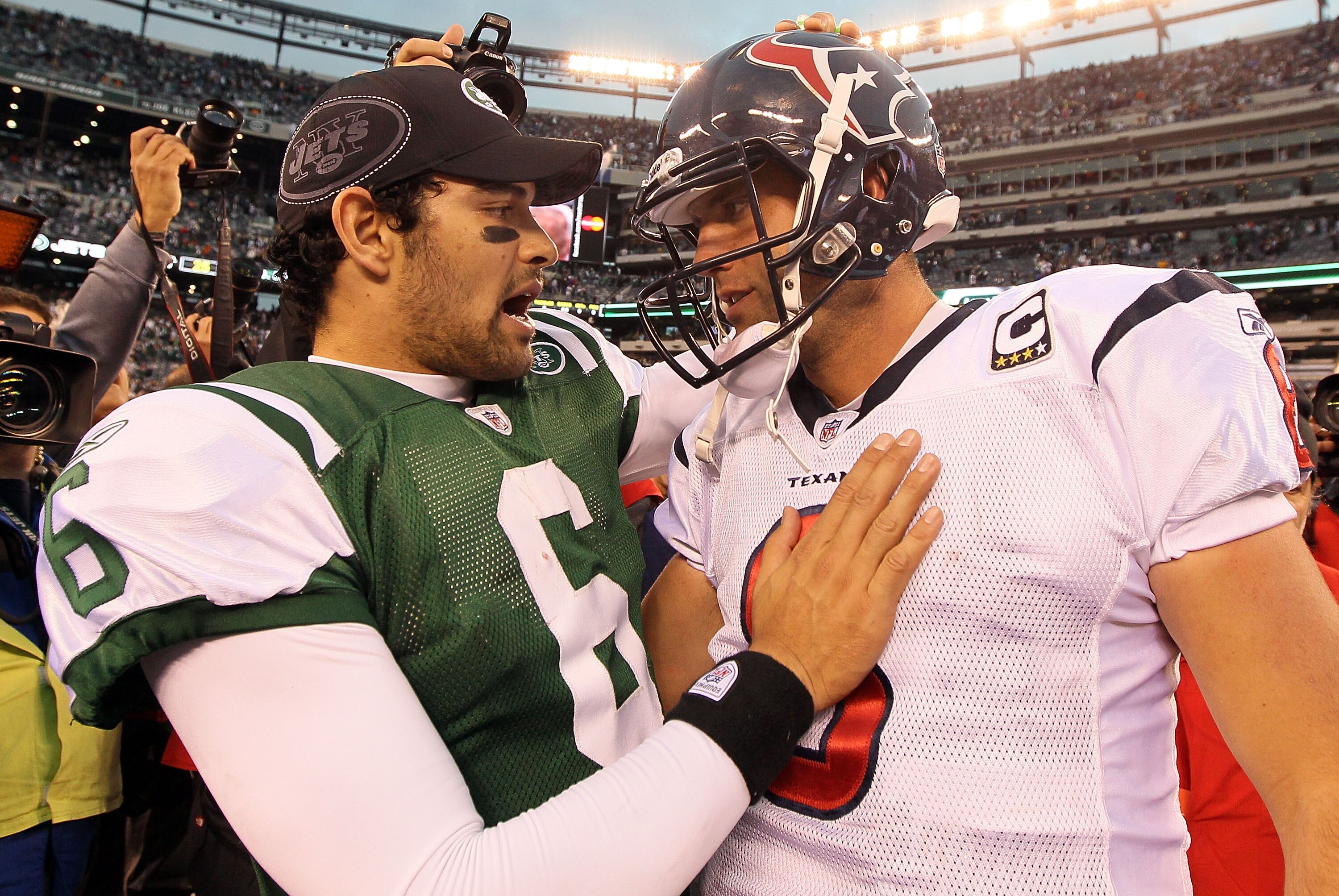 EAST RUTHERFORD, NJ - NOVEMBER 21: Mark Sanchez #6 of the New York Jets talks with Matt Schaub #8 the Houston Texans after their game on November 21, 2010 at the New Meadowlands Stadium in East Rutherford, New Jersey. The Jets defeated the Texans 30-27.