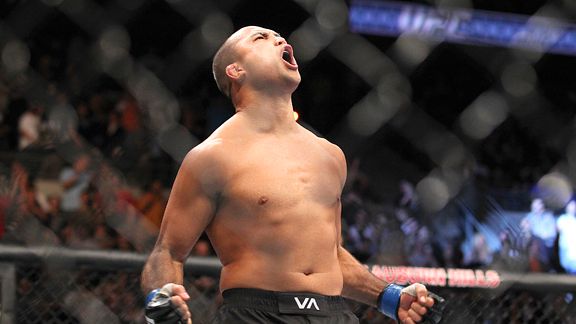 BJ Penn defeats Matt Hughes at UFC 123 photograph from: <a href="http://a.espncdn.com/photo/2010/1120/mma_penn_hughes3x_576.jpg">ESPN.com</a>