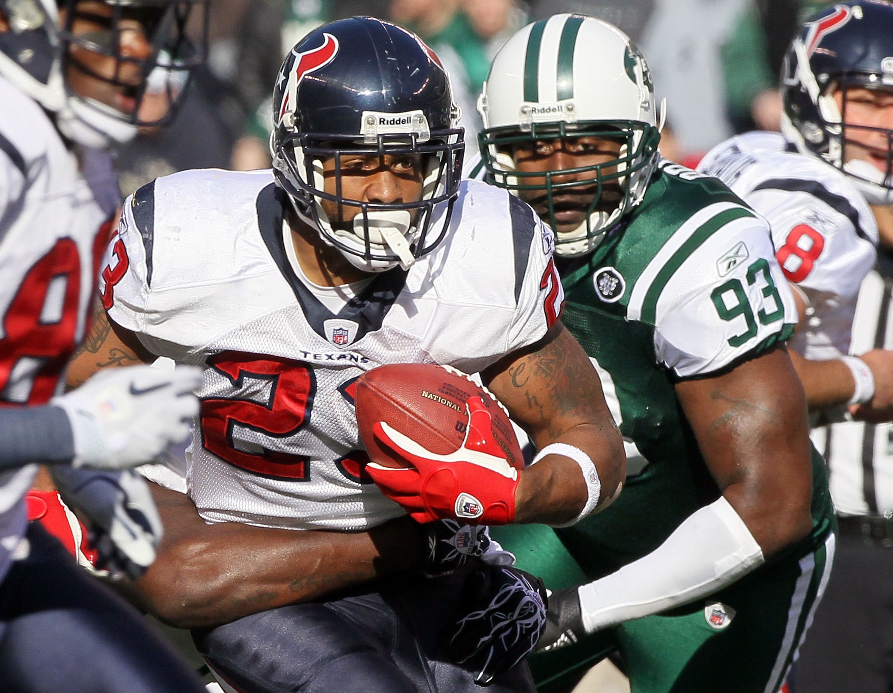 EAST RUTHERFORD, NJ - NOVEMBER 21:  Arian Foster #23 of the Houston Texans runs the ball against Trevor Pryce #93 of the New York Jets on November 21, 2010 at the New Meadowlands Stadium in East Rutherford, New Jersey.  (Photo by Jim McIsaac/Getty Images)