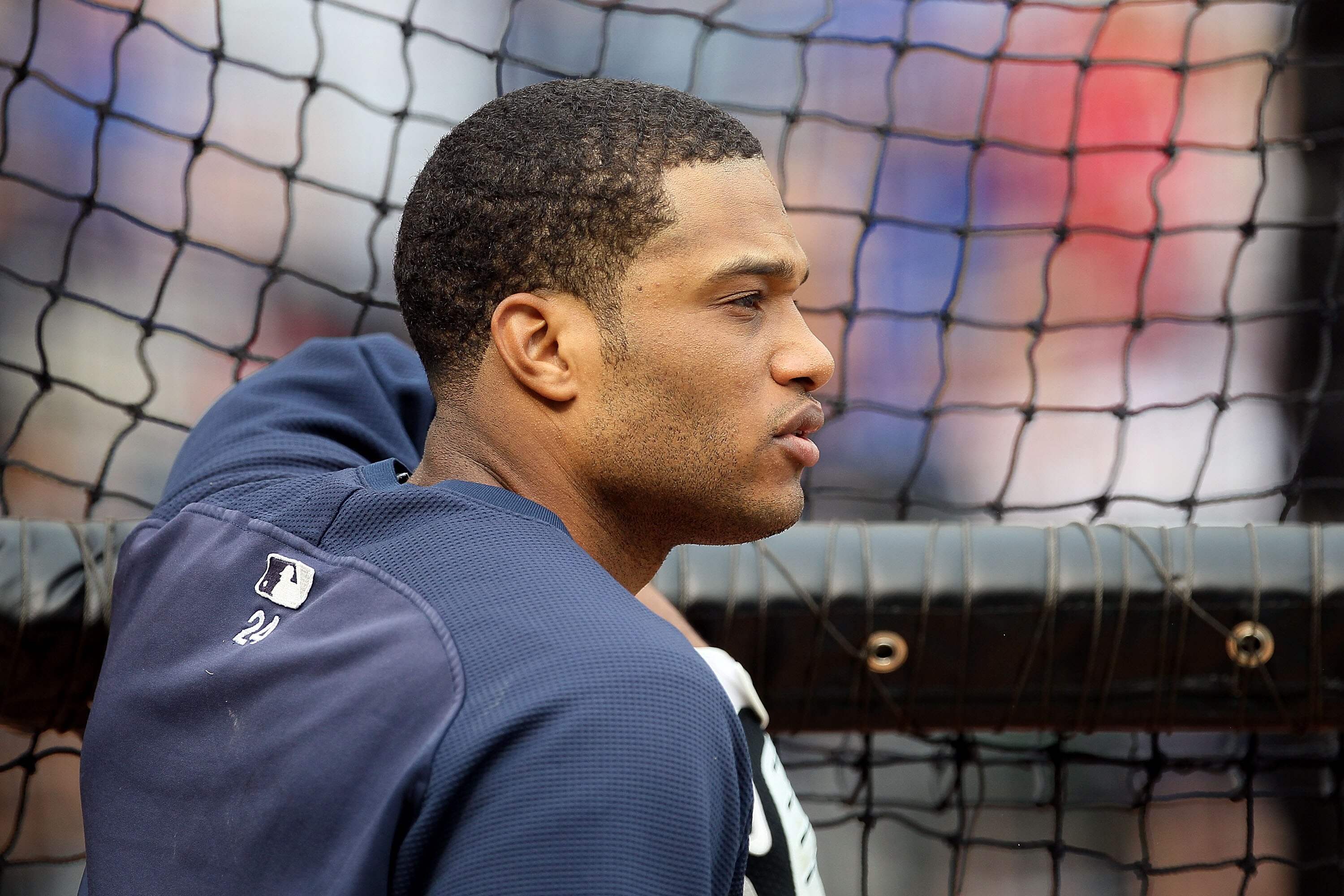 ARLINGTON, TX - OCTOBER 22:  Robinson Cano #24 of the New York Yankees looks on during batting practice against the Texas Rangers in Game Six of the ALCS during the 2010 MLB Playoffs at Rangers Ballpark in Arlington on October 22, 2010 in Arlington, Texas