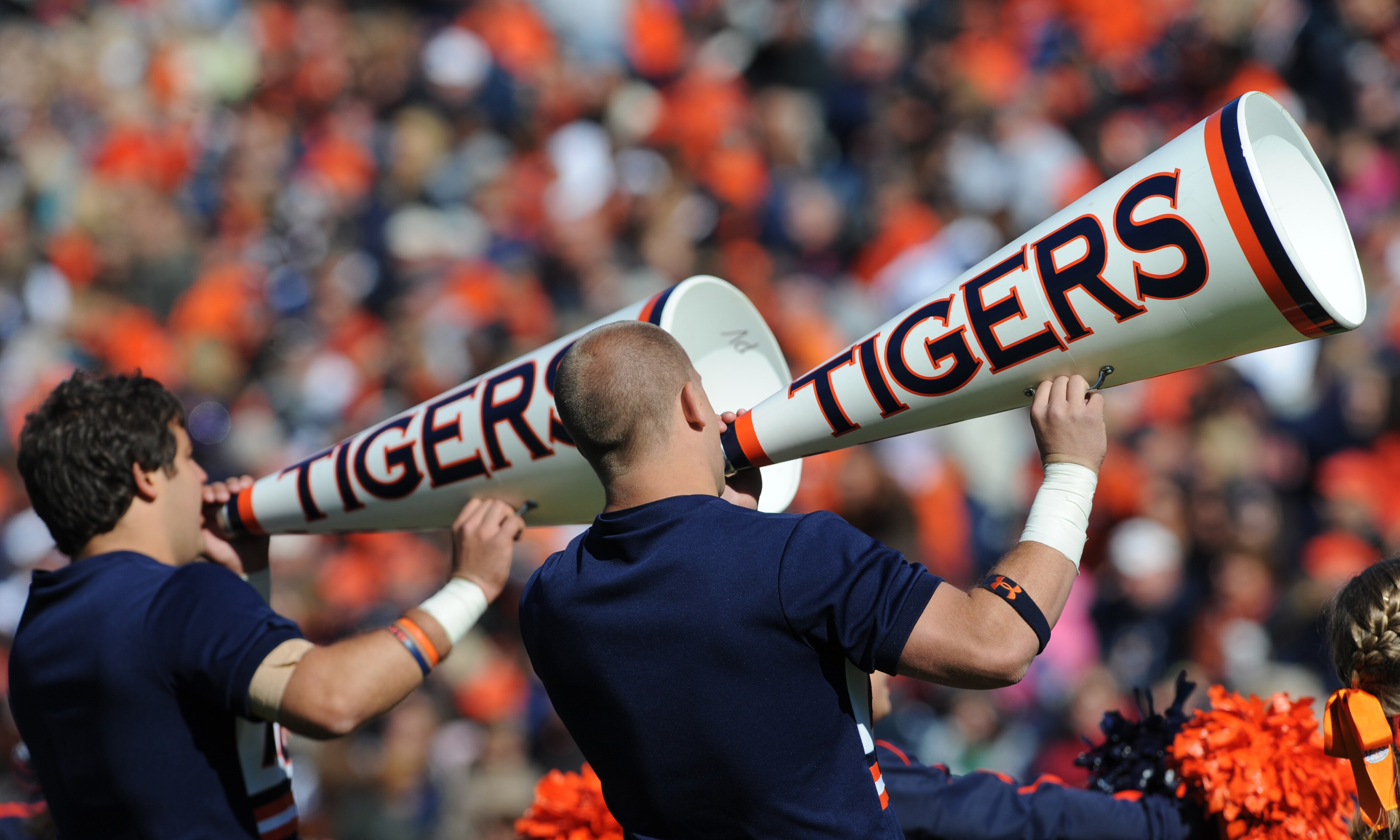 AUBURN, AL - NOVEMBER 06:  Cheerleaders of the Auburn Tigers entertain on the sidelines during play against the Chattanooga Mocs November 6, 2010 at Jordan-Hare Stadium in Auburn, Alabama.  (Photo by Al Messerschmidt/Getty Images)