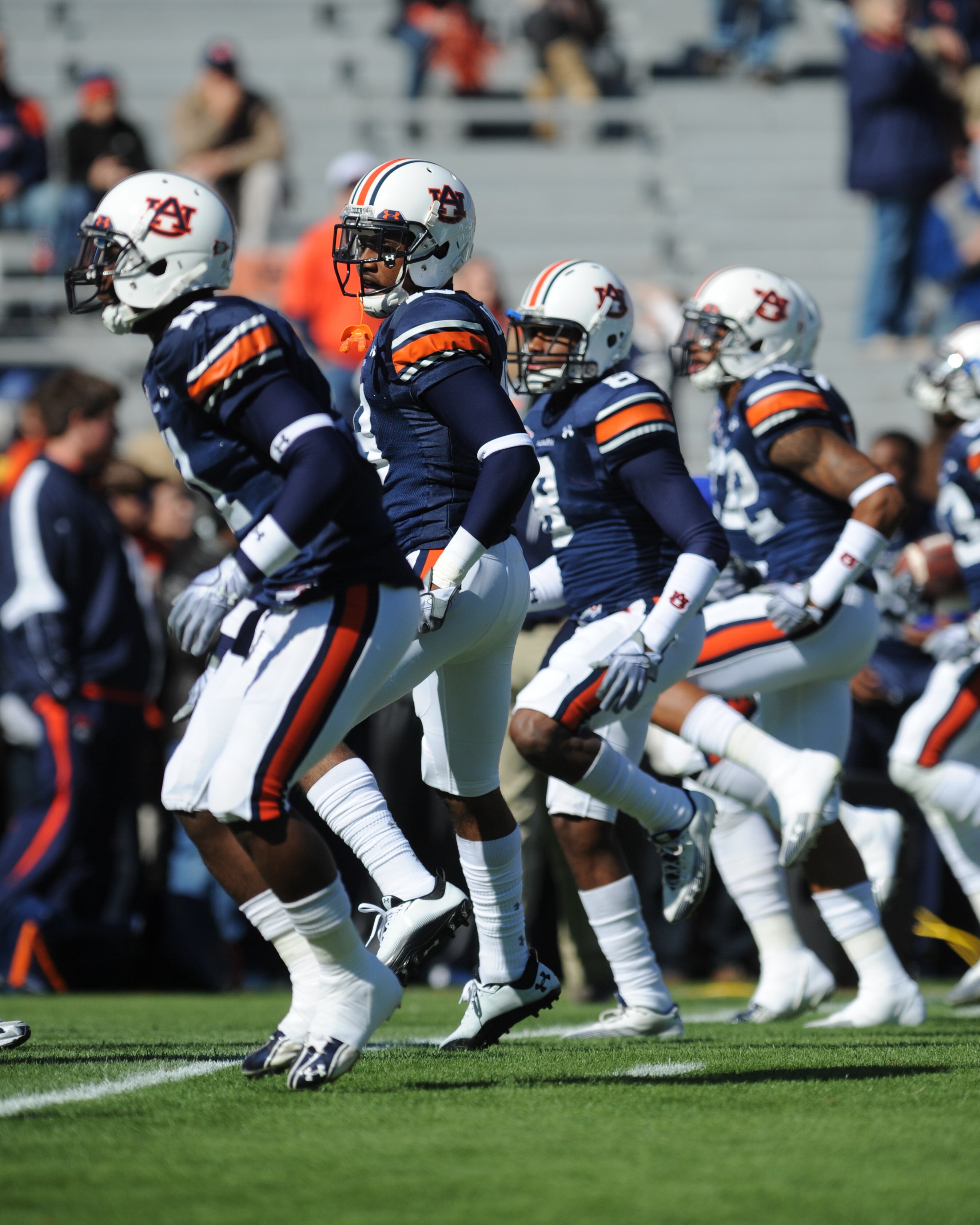 AUBURN, AL - NOVEMBER 06:  Players of the Auburn Tigers warm up against the Chattanooga Mocs November 6, 2010 at Jordan-Hare Stadium in Auburn, Alabama.  (Photo by Al Messerschmidt/Getty Images)