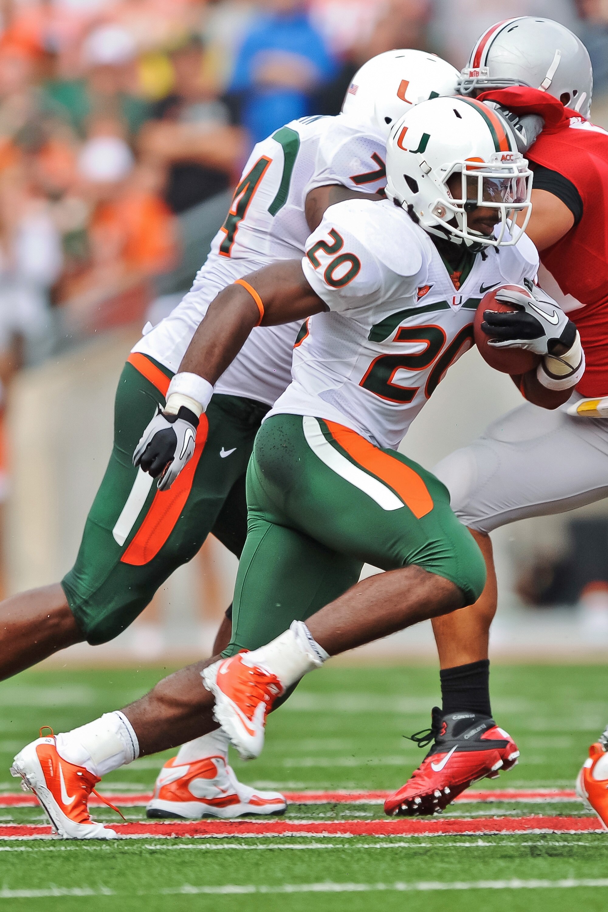 COLUMBUS, OH - SEPTEMBER 11:  Damien Berry #20 of the Miami Hurricanes runs with the ball against the Ohio State Buckeyes at Ohio Stadium on September 11, 2010 in Columbus, Ohio.  (Photo by Jamie Sabau/Getty Images)