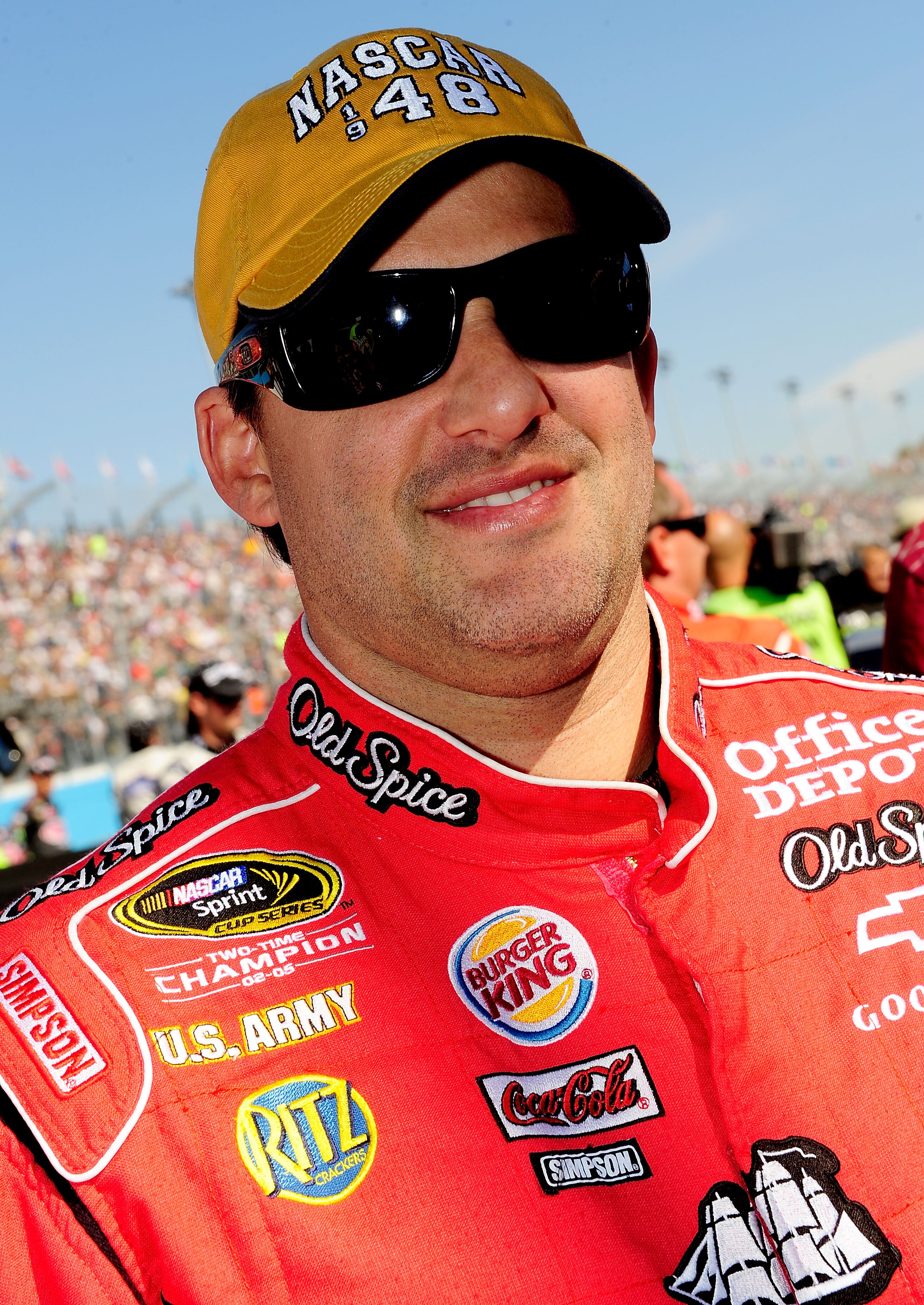 AVONDALE, AZ - NOVEMBER 14:  Tony Stewart, driver of the #14 Old Spice/Office Depot Chevrolet, stands on the starting grid prior to the NASCAR Sprint Cup Series Kobalt Tools 500 at Phoenix International Raceway on November 14, 2010 in Avondale, Arizona.  