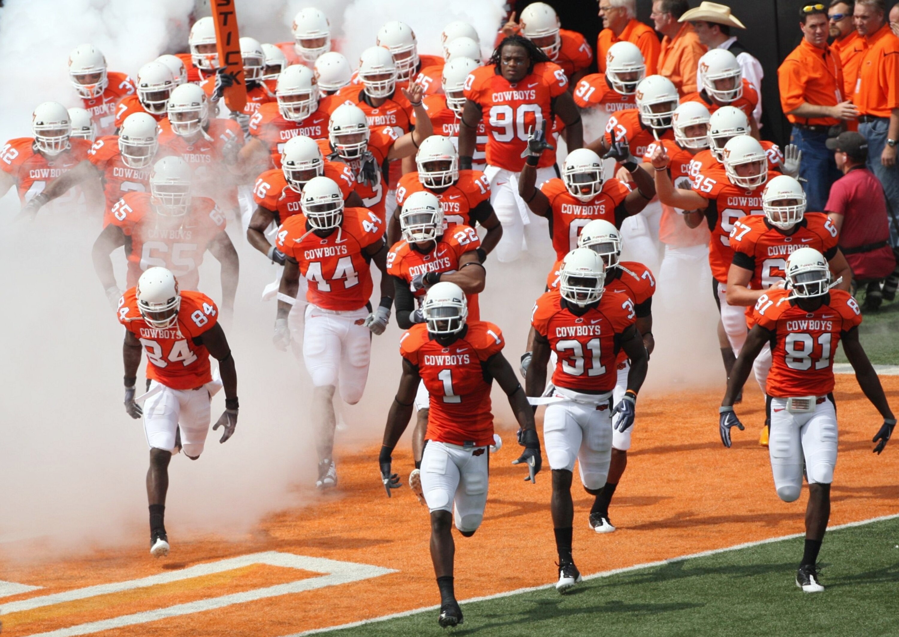 STILLWATER, OK - SEPTEMBER 5:  The Oklahoma State Cowboys run on to the field to start the game against the Georgia Bulldogs at Boone Pickens Stadium on September 5, 2009 in Stillwater, Oklahoma. (Photo by Christian Petersen/Getty Images)
