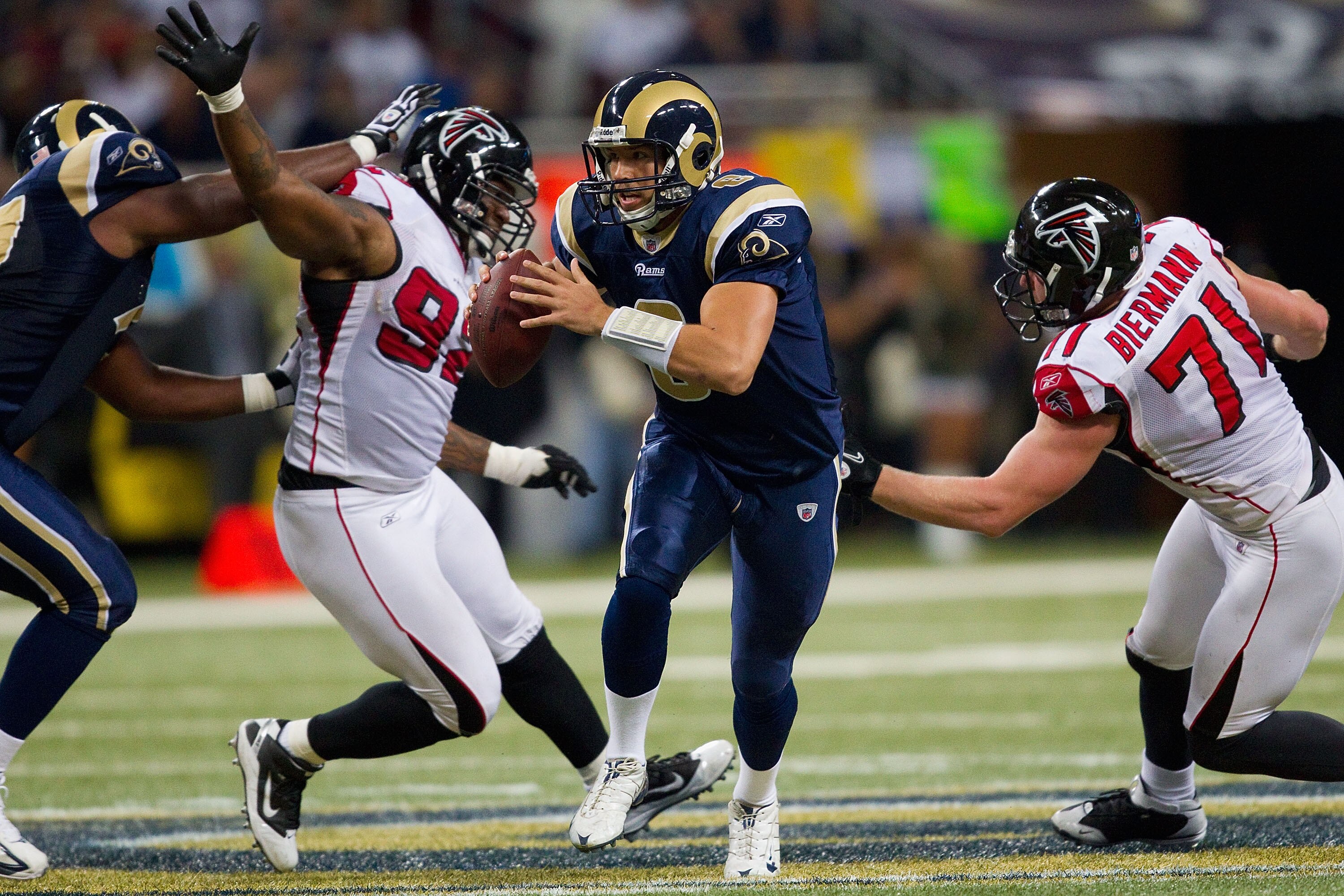 ST. LOUIS - NOVEMBER 21: Sam Bradford #8 of the St. Louis Rams scrambles against the Atlanta Falcons at the Edward Jones Dome on November 21, 2010 in St. Louis, Missouri.  The Falcons beat the Rams 34-17.  (Photo by Dilip Vishwanat/Getty Images)