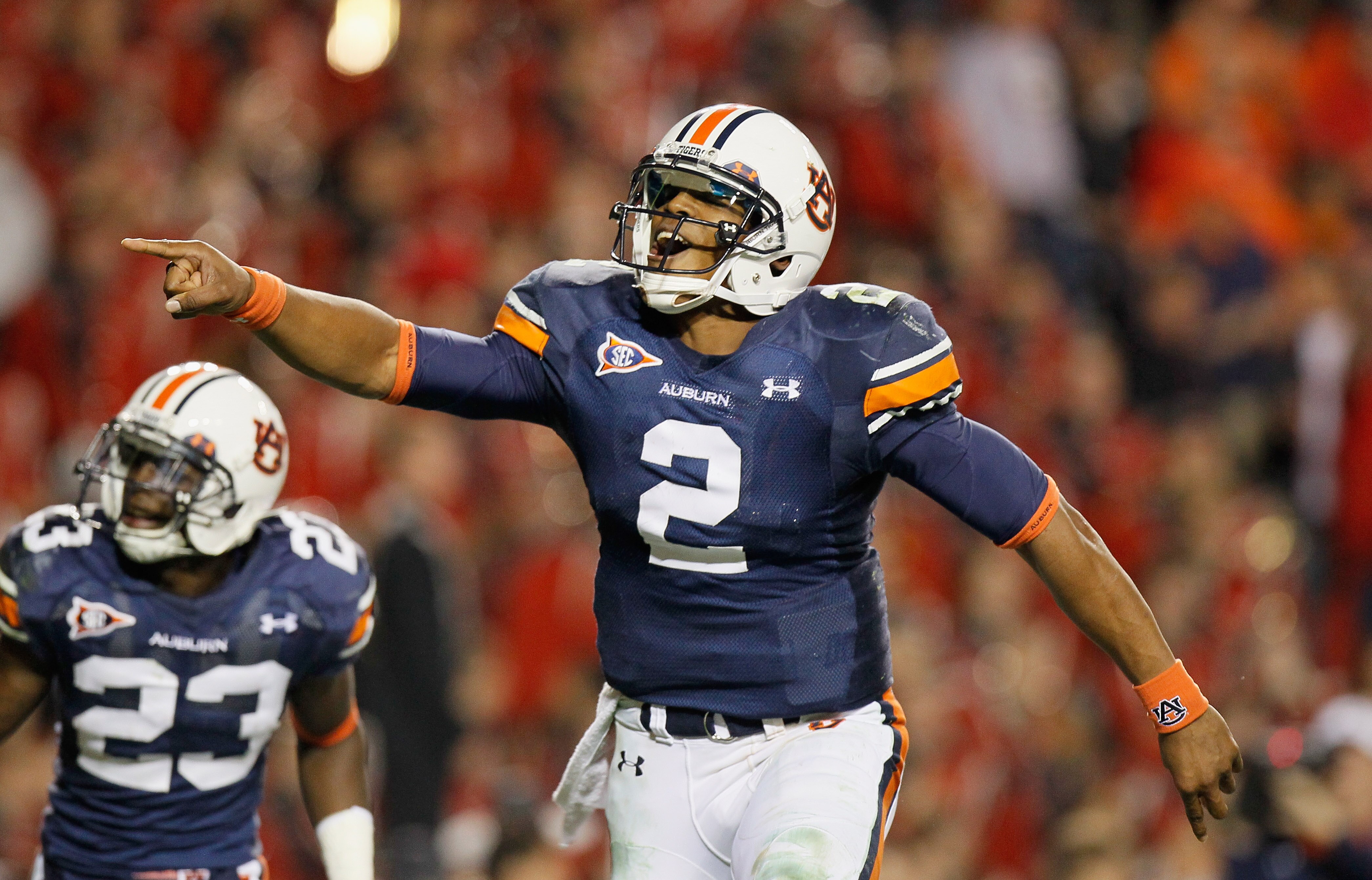 AUBURN, AL - NOVEMBER 13:  Quarterback Cameron Newton #2 of the Auburn Tigers celebrates after a touchdown against the Georgia Bulldogs at Jordan-Hare Stadium on November 13, 2010 in Auburn, Alabama.  (Photo by Kevin C. Cox/Getty Images)