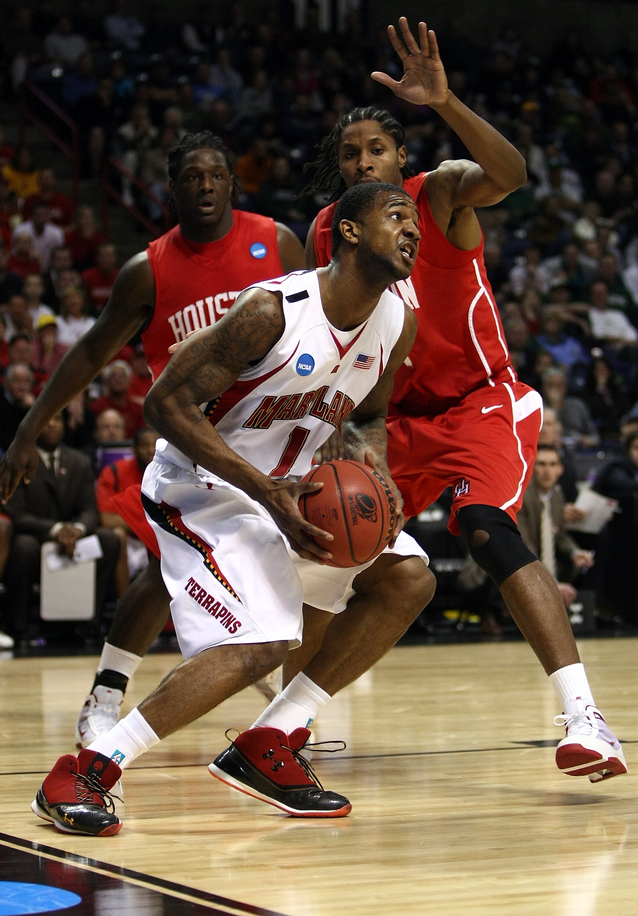 SPOKANE, WA - MARCH 19:  Sean Coleman #1 of the Maryland Terrapins drives against Maurice McNeil #3 of the Houston Cougars during the first round of the 2010 NCAA menÕs basketball tournament at Spokane Arena on March 19, 2010 in Spokane, Washington.  (Pho