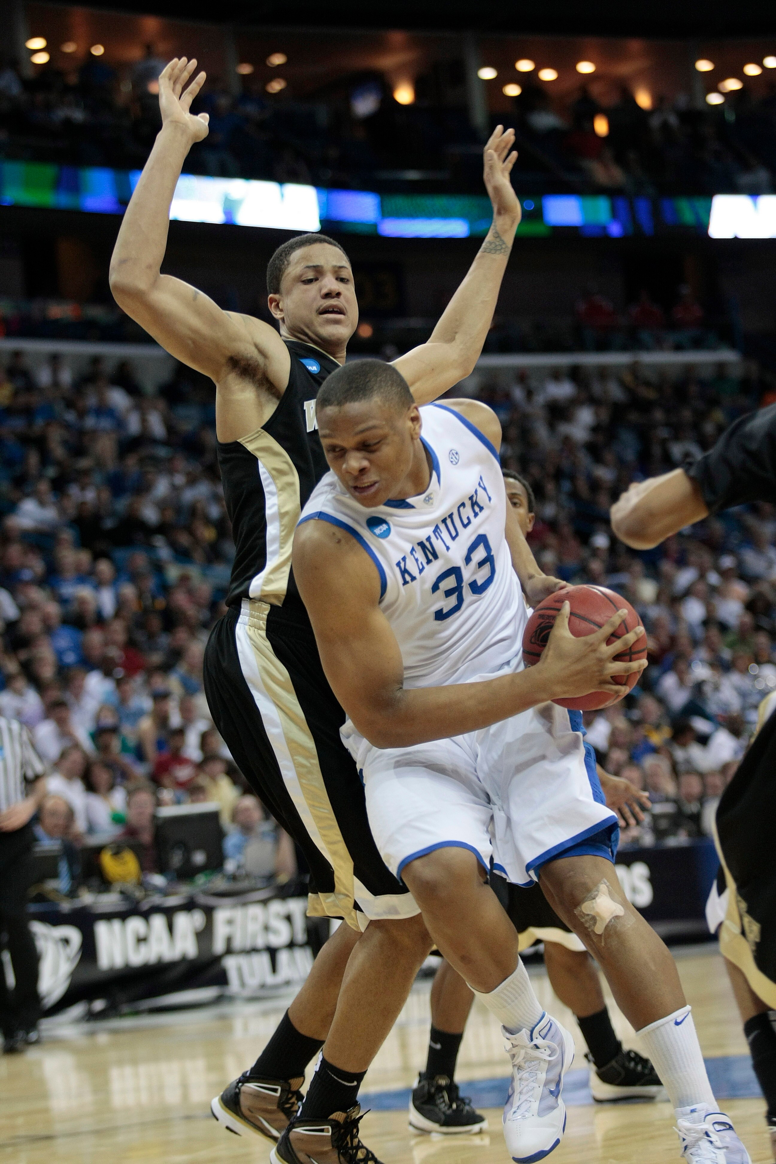 NEW ORLEANS - MARCH 20:  Daniel Orton #33 of the Kentucky Wildcats battles Tony Woods #55 of the Wake Forest Demon Deacons during the second round of the 2010 NCAA men's basketball tournament at the New Orleans Arena on March 20, 2010 in New Orleans, Loui