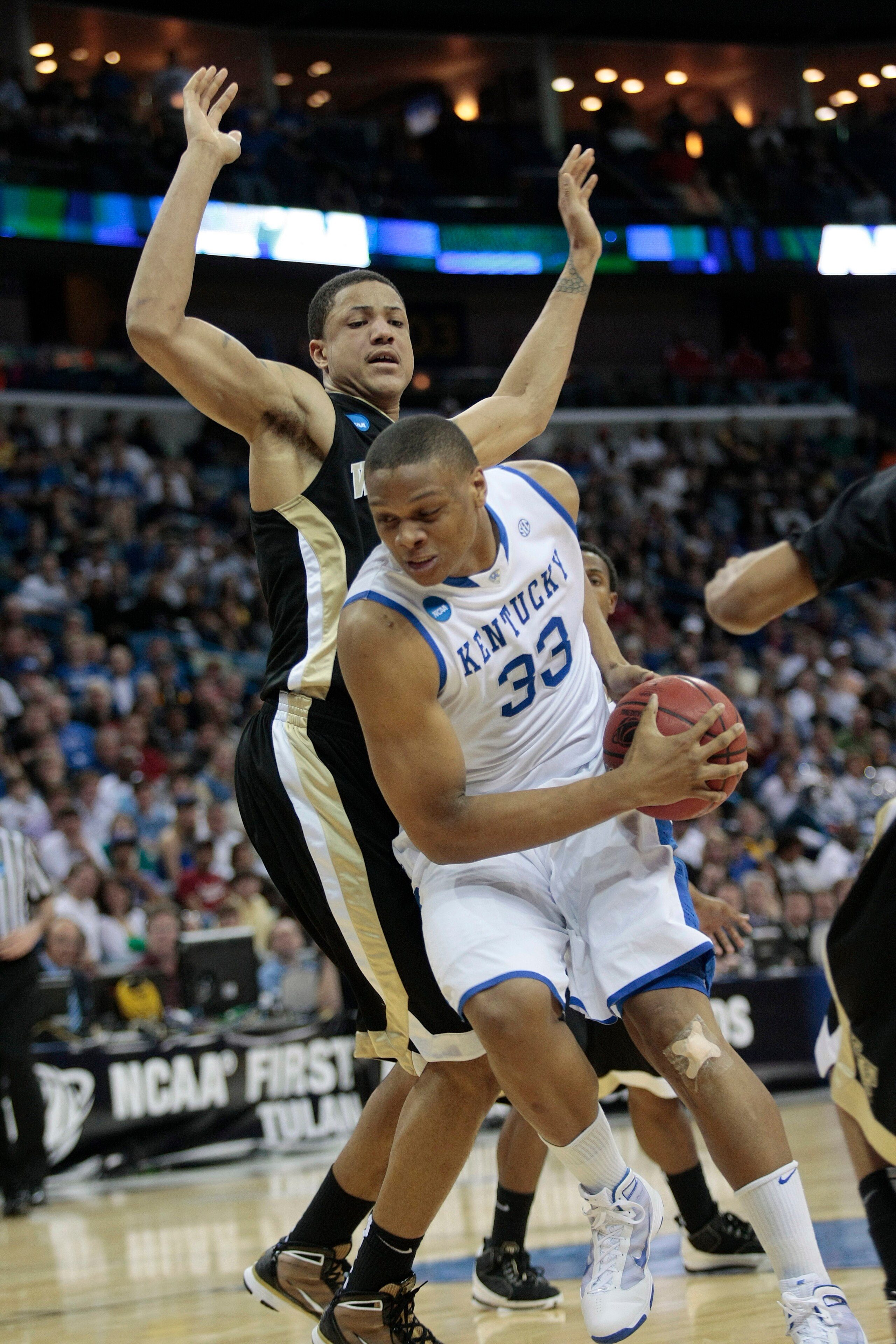 NEW ORLEANS - MARCH 20:  Daniel Orton #33 of the Kentucky Wildcats battles Tony Woods #55 of the Wake Forest Demon Deacons during the second round of the 2010 NCAA men's basketball tournament at the New Orleans Arena on March 20, 2010 in New Orleans, Loui