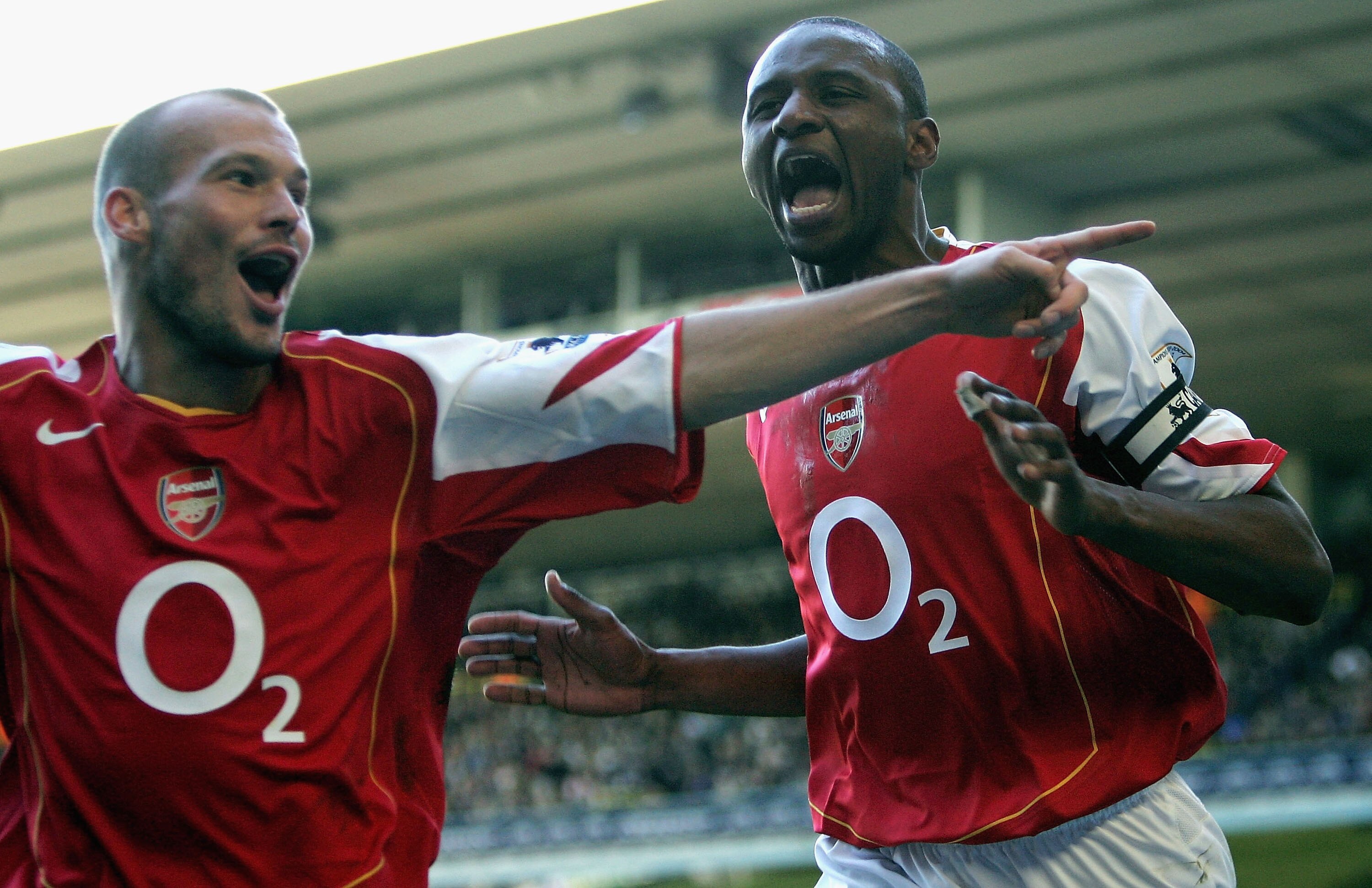 LONDON - NOVEMBER 13:  Patrick Vieira of Arsenal celebrates his goal with Freddie Ljungberg during the Barclays Premiership match between Tottenham Hotspur and Arsenal at White Hart Lane on November 13, 2004 in London, England.  (Photo by Ian Walton/Getty