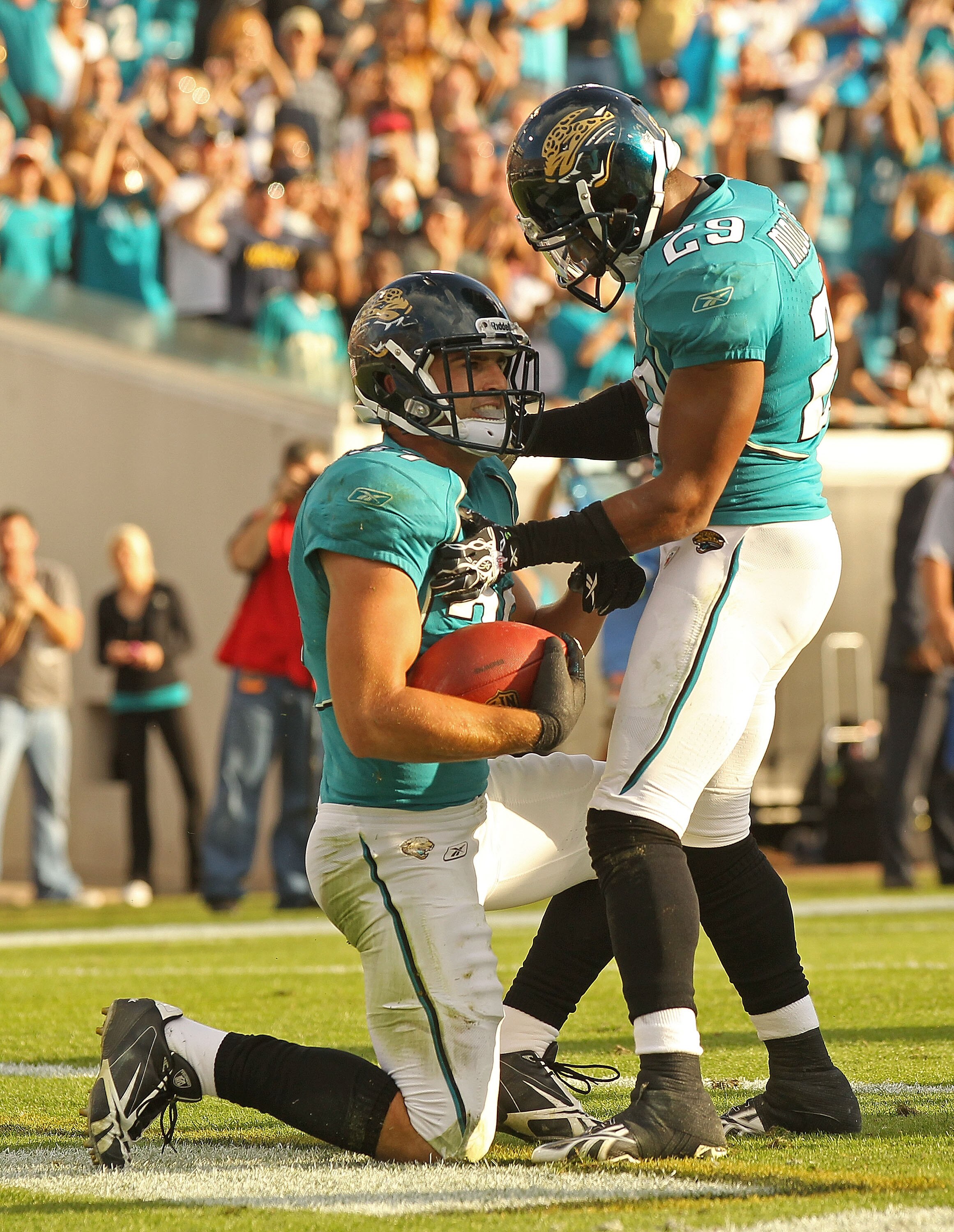 JACKSONVILLE, FL - NOVEMBER 21:  Sean Considine #37 of the Jacksonville Jaguars is congratulated by William Middleton #29 after recovering an interception  to end the game agaisnt the Cleveland Browns at EverBank Field on November 21, 2010 in Jacksonville