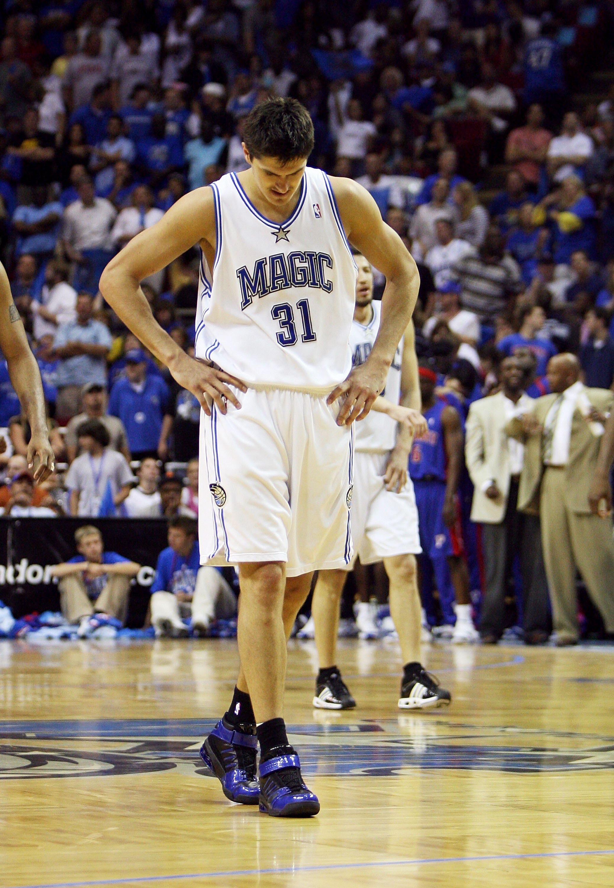 ORLANDO, FL - APRIL 28:  Darko Milicic #31 of the Orlando Magic walks back toward the Magic bench after comitting a turn-over late in the game against the Detroit Pistons in Game Four of the Eastern Conference Quarterfinals during the 2007 NBA Playoffs at