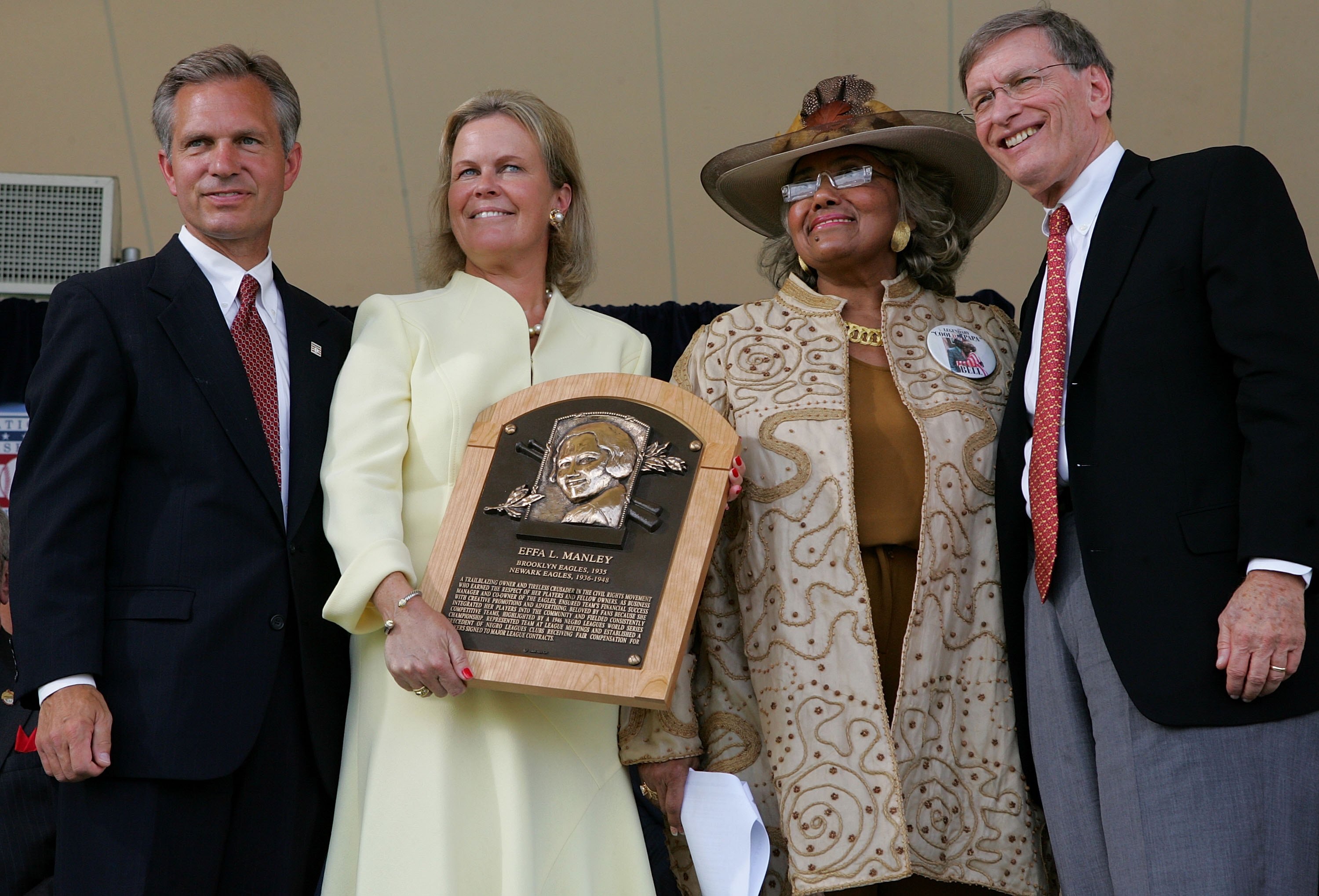 COOPERSTOWN, NY - JULY 30: Connie Brooks (2nd-R), the niece of 2006 inductee Effa Manley, accepts Manley's Hall of Fame plaque from the National Baseball Hall of Fame and Museum president Dale Petroskey (L) and chairwomen Jane Forbes Clark and MLB commiss