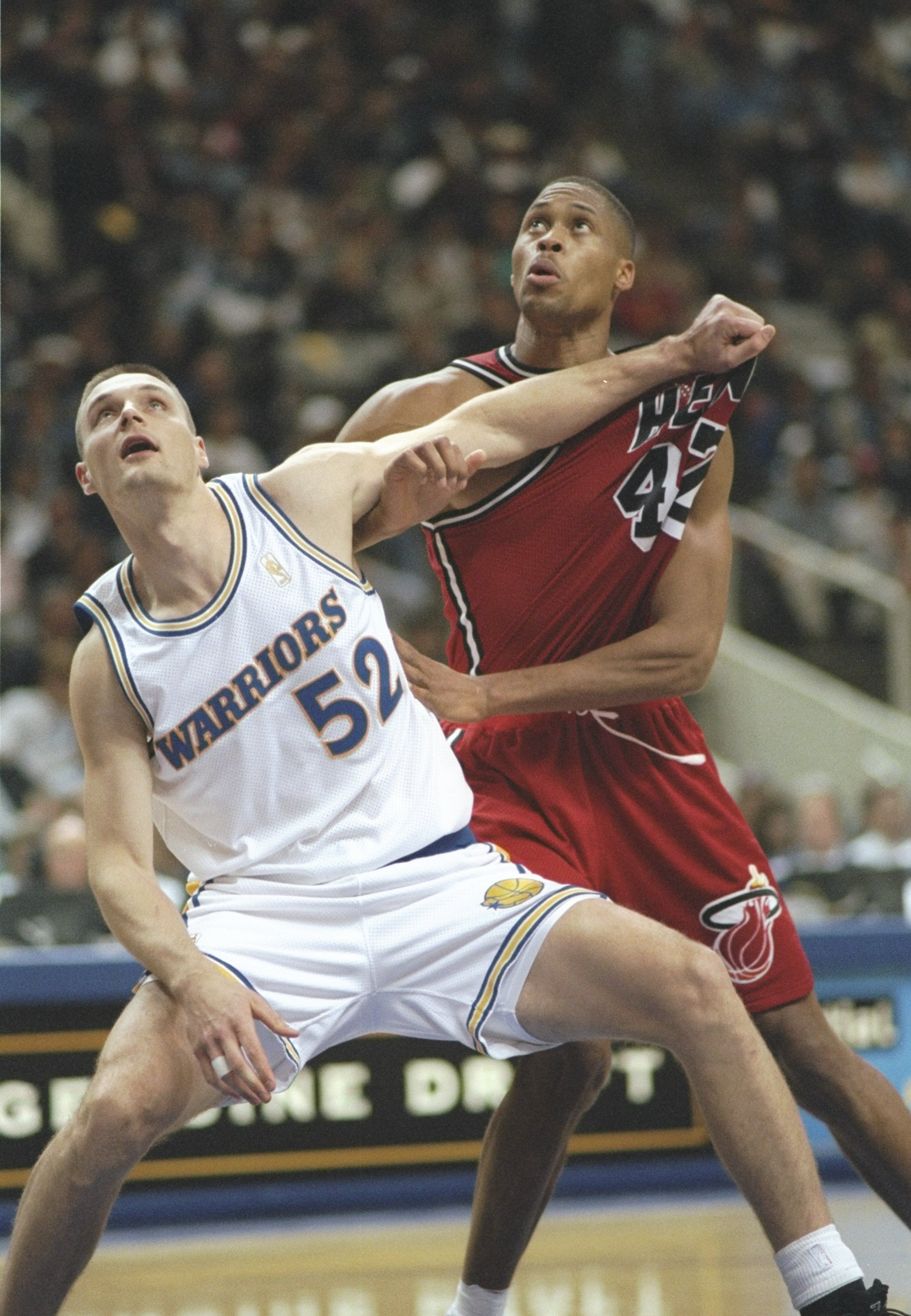 26 Nov 1996: Center Todd Fuller of the Golden State Warriors and P.J. Brown of the Miami Heat fight for position during a game at the San Jose Arena in San Jose, California. The Heat won the game 107-88.