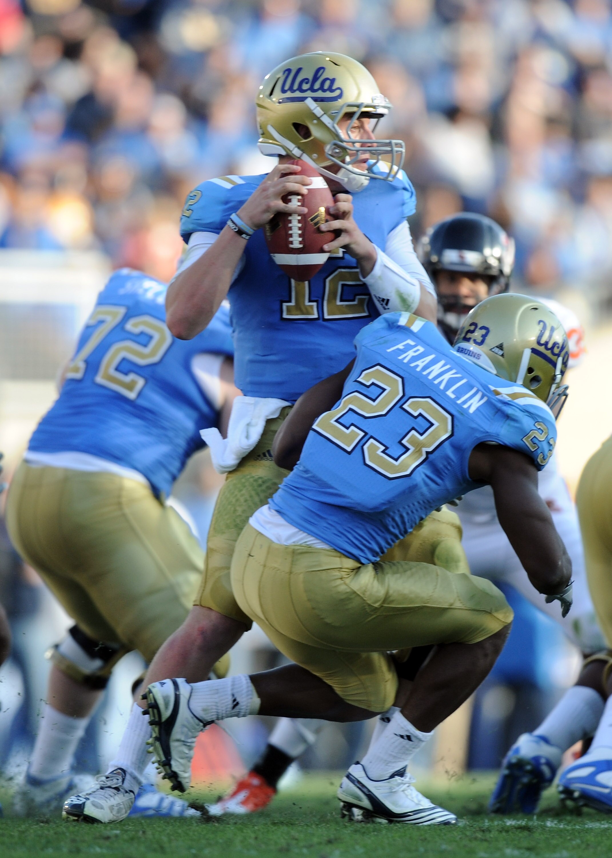 PASADENA, CA - NOVEMBER 06:  Richard Brehaut #12 of the UCLA Bruins in the pocket against the Oregon State Beavers at the Rose Bowl on November 6, 2010 in Pasadena, California.  (Photo by Harry How/Getty Images)